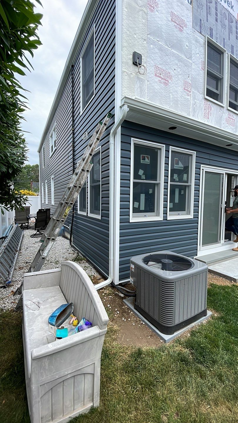 Gutter Installation using 5"white K style seamless gutters and 2x3 white leaders by Above All Gutters 