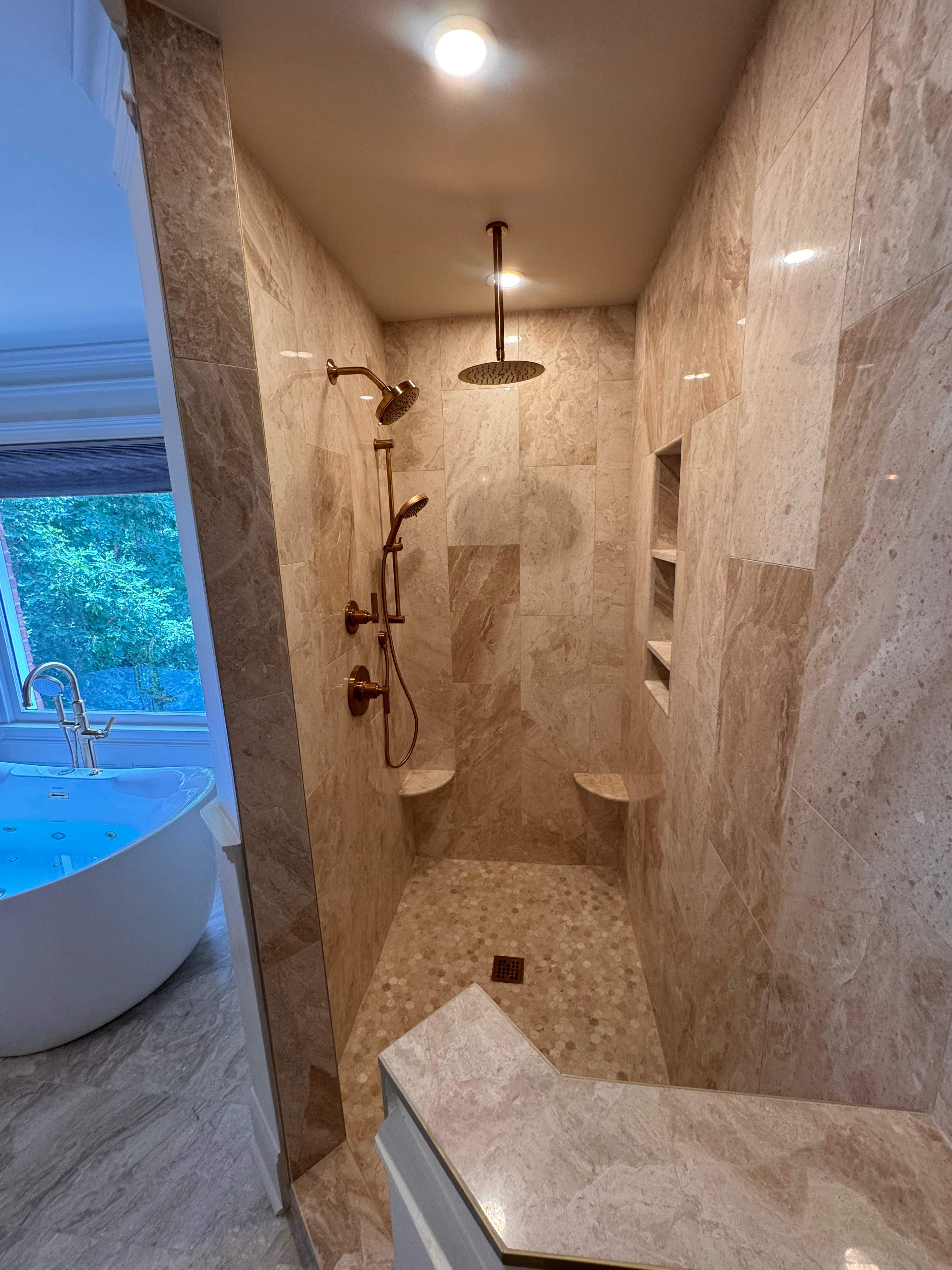 Master bathroom renovation using Free standing tub by Prudencio