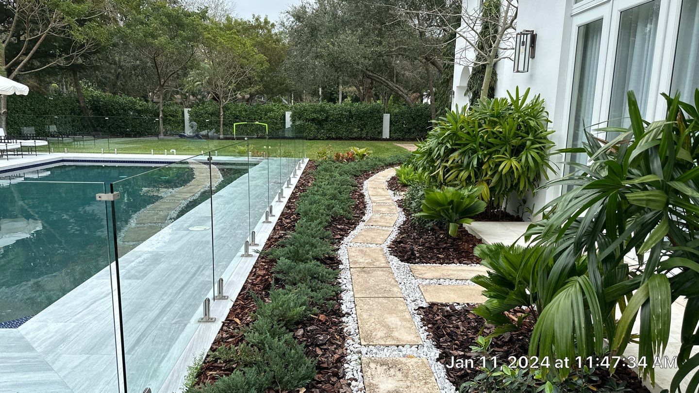 Backyard Landscape Renovation by Nature's Dream Landscape and Tree Service