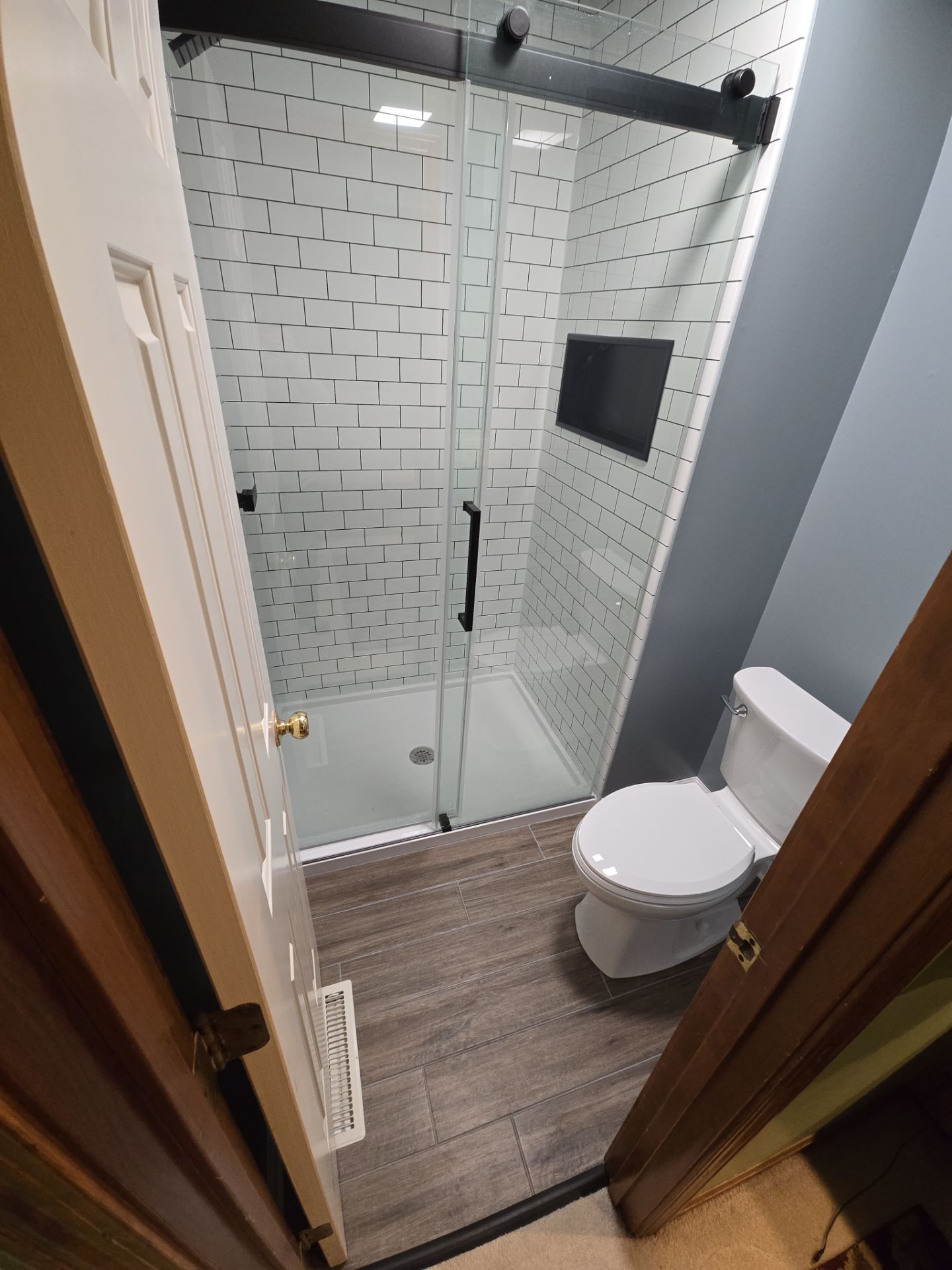 Shower Replacement and Tile Floor by The Shower Company