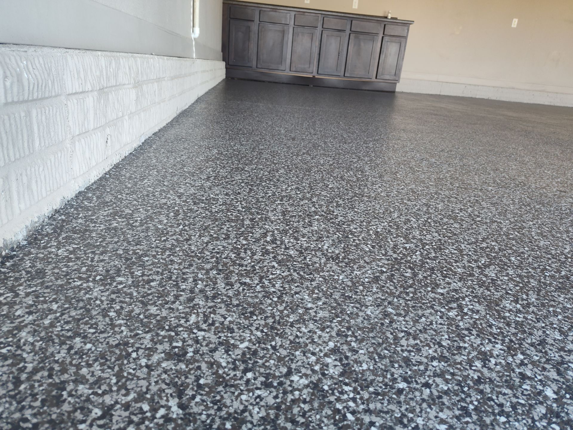 Another Garage Protected from Rock Salt & Chemicals by Revival Concrete Coatings, LLC