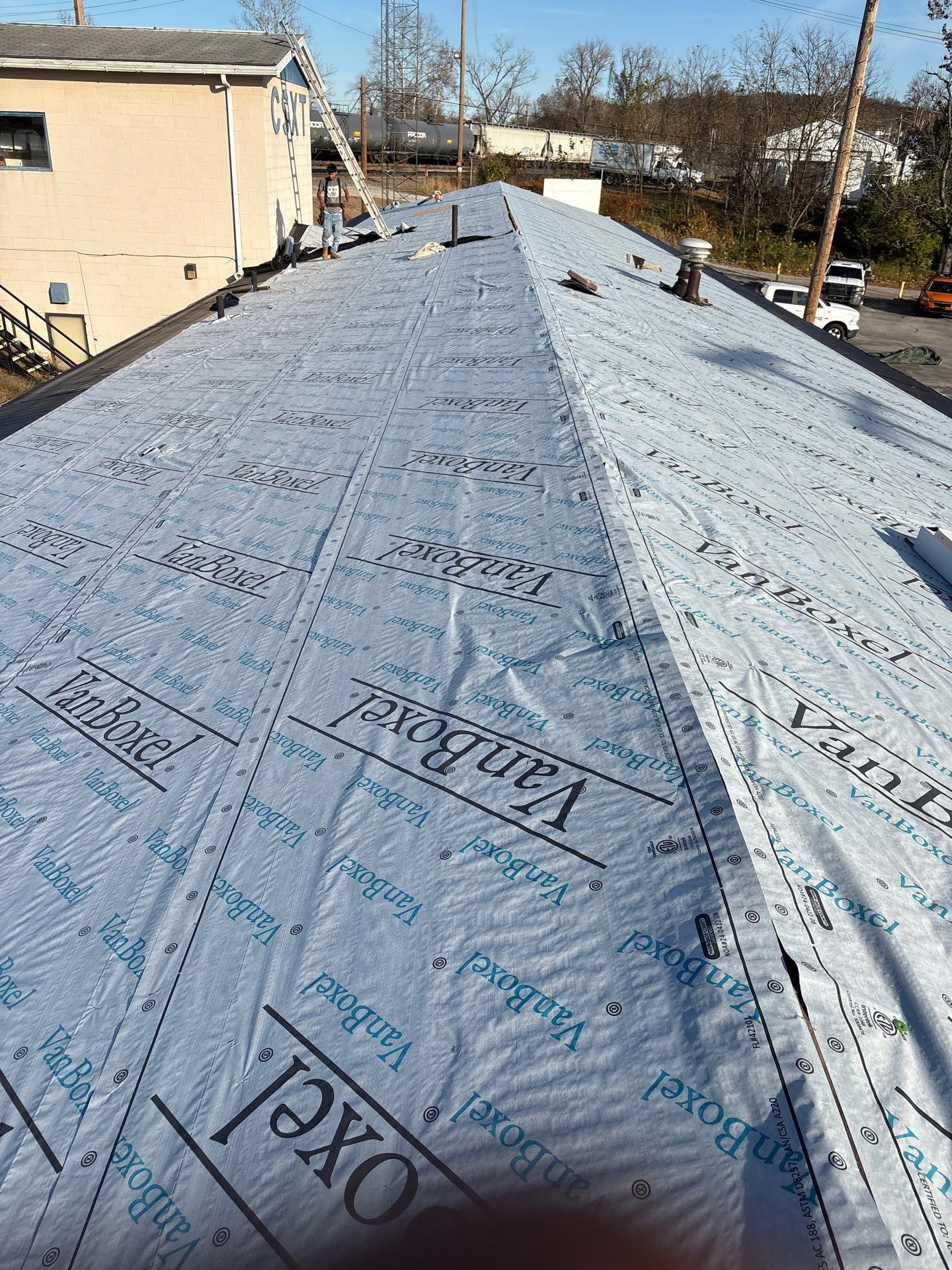 Commercial Roofing Installation using GAF Timberline HDZ Pewter Gray by Rainstoppers Roofing