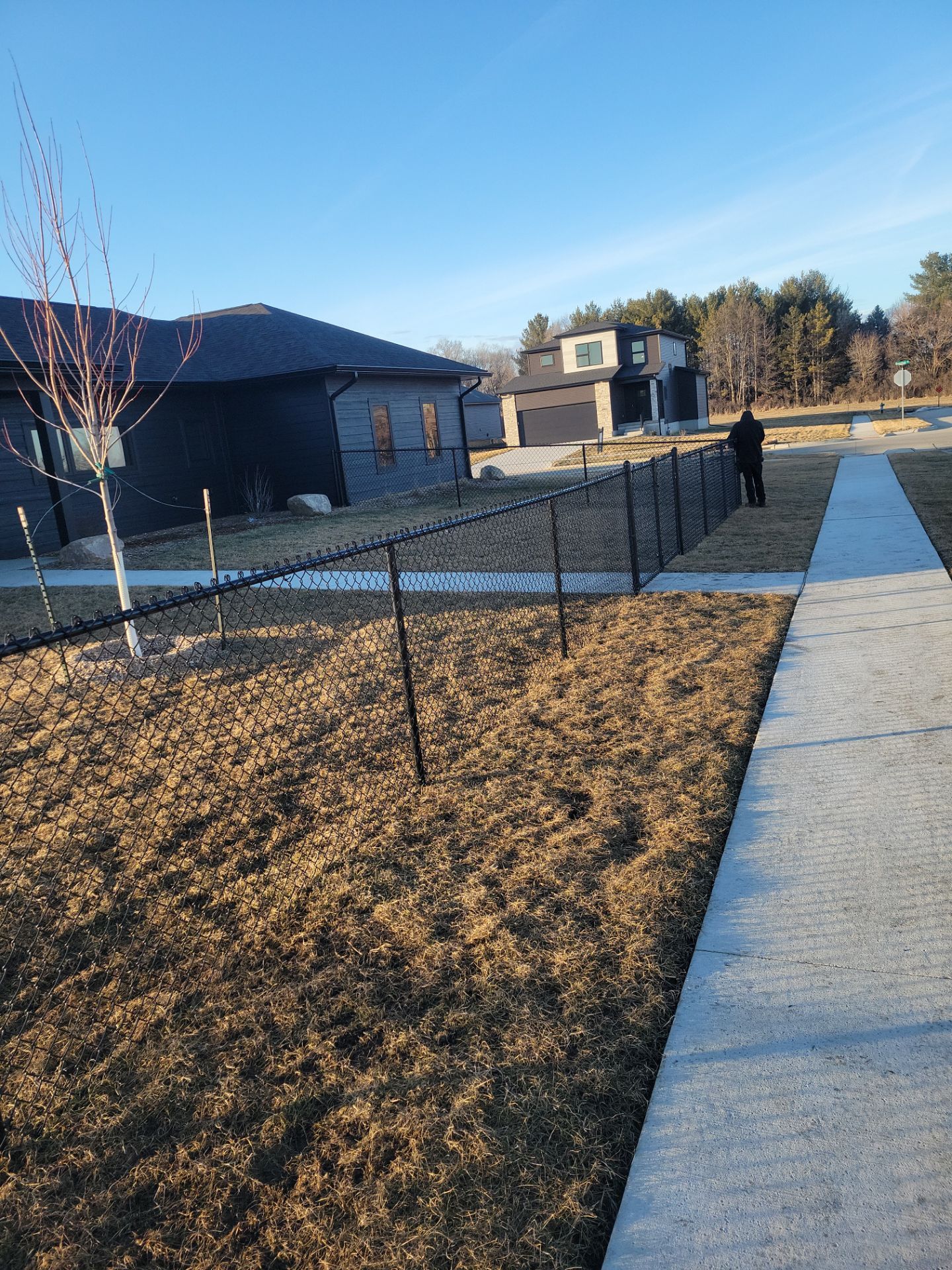 Residential Fencing Installation for New Construction Homes in Cedar Falls by Perfect Picket Fence and Stain