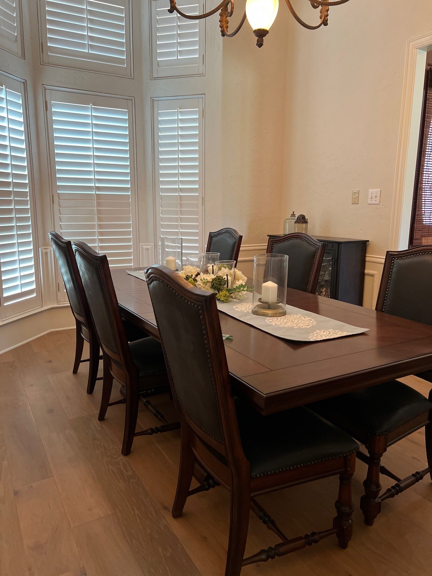 Wide-Plank Wood Flooring Replacement and Custom Herringbone Entryway by Simmons Floors 