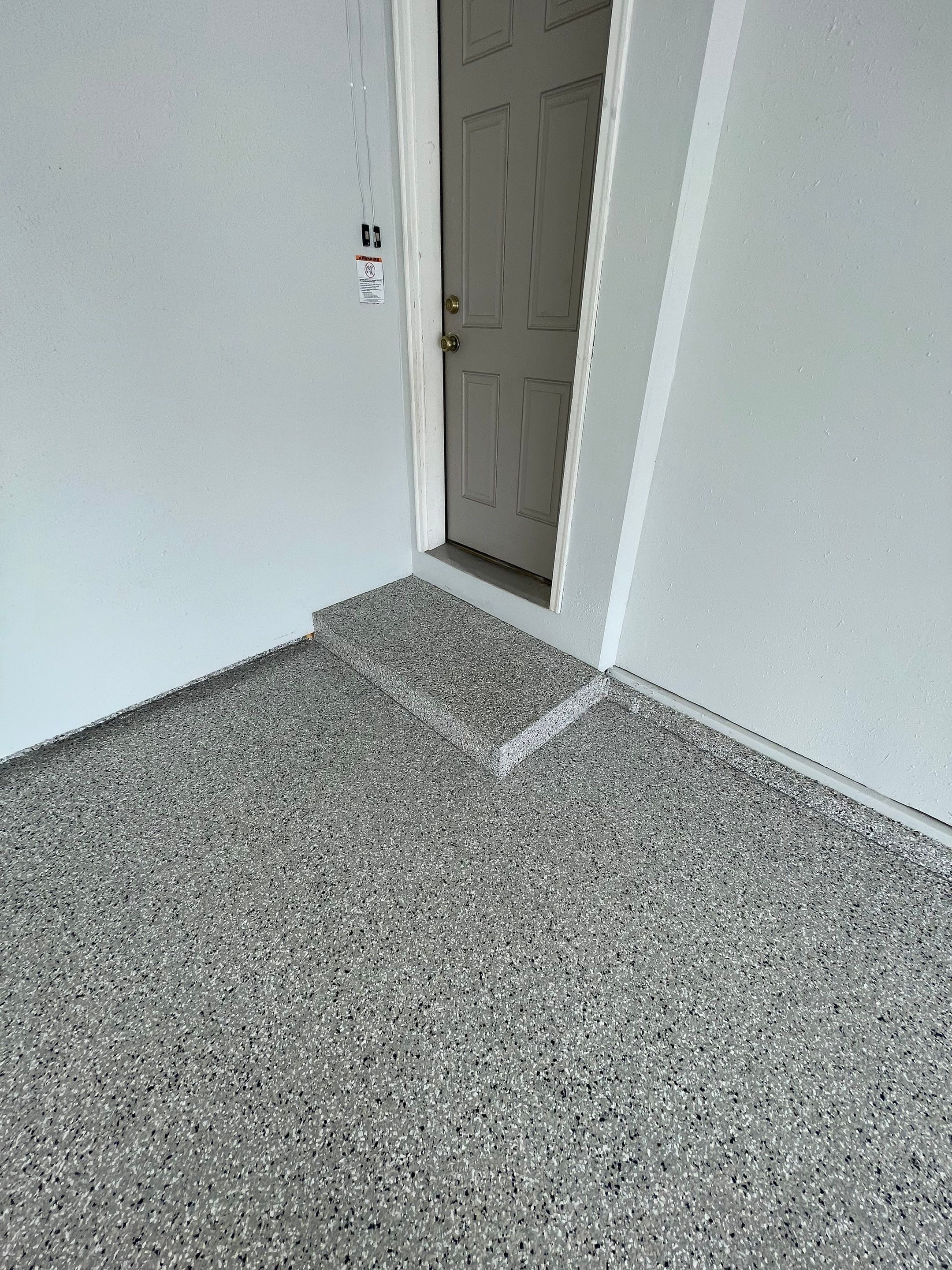 Multi-Car Garage Floor Coating and Crack Repair in Tea by Select Painting, Coatings & Garage Cabinets