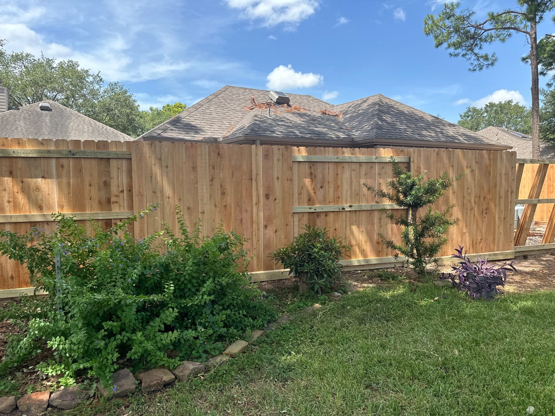 Wood fence project in Cypress by Tim's Fences