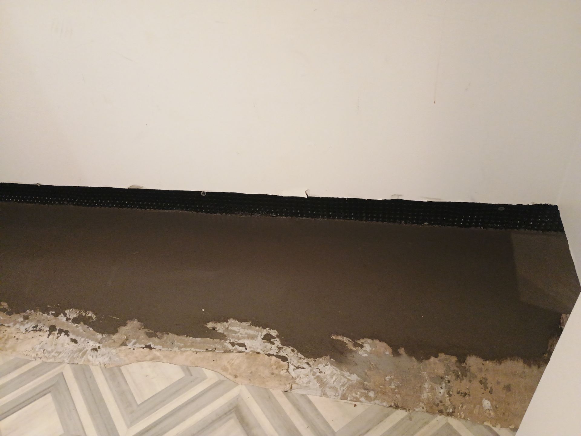 Interior Drain Tile & Buried Discharge in St. Anthony, MN by Waterproofing Northeast