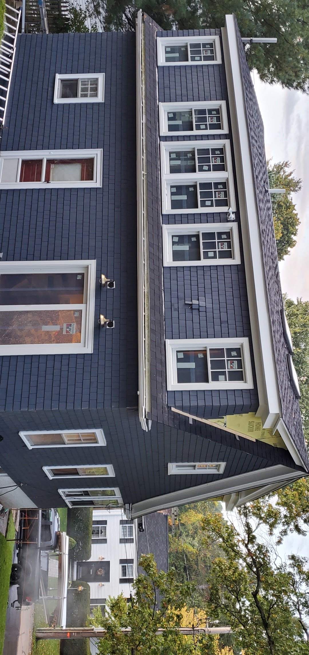Siding Installation using Red Cedar by UBrothers Construction