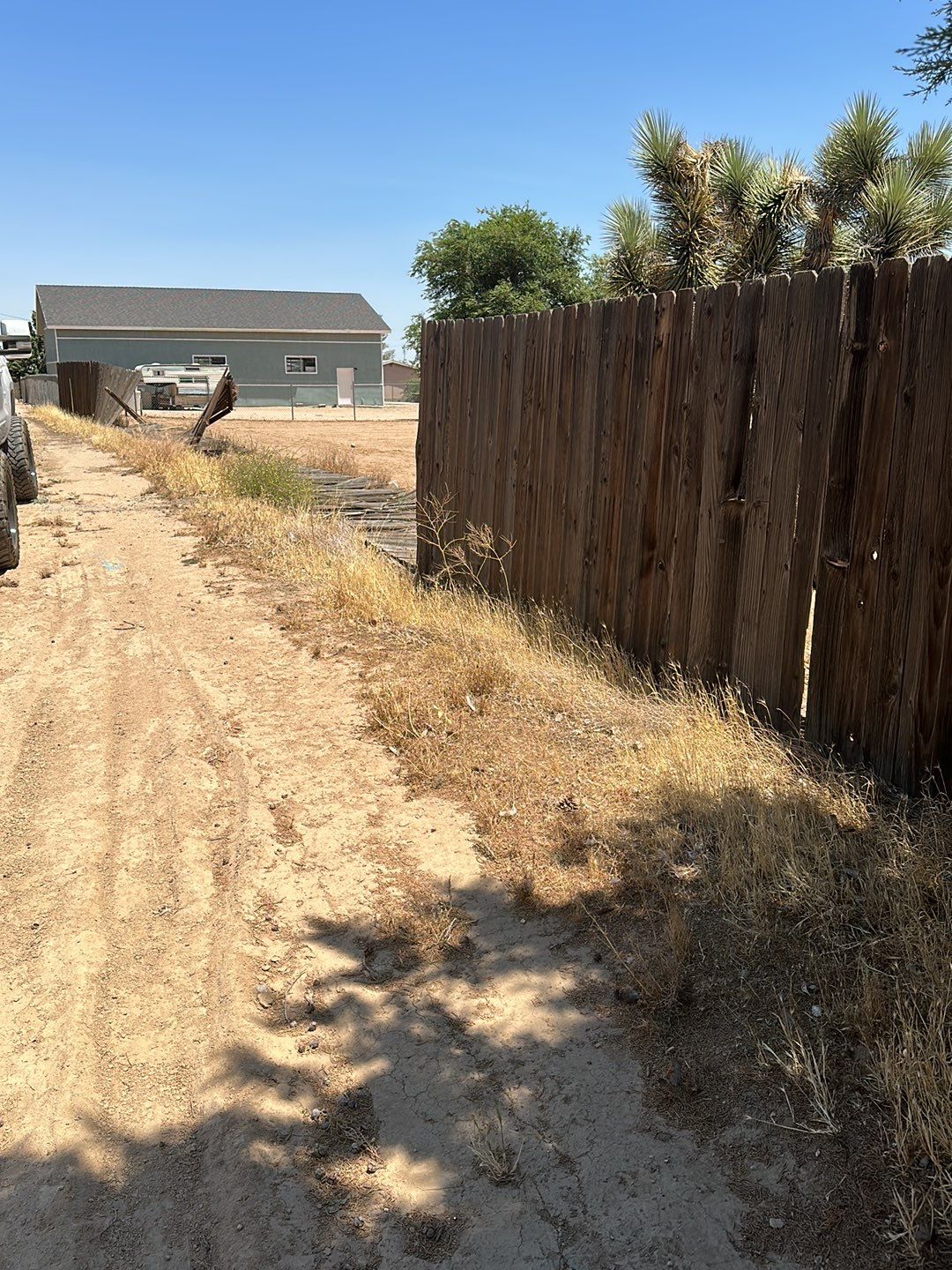 Replaced wood fence with chain link fence.  by Fence Guys Inc. 