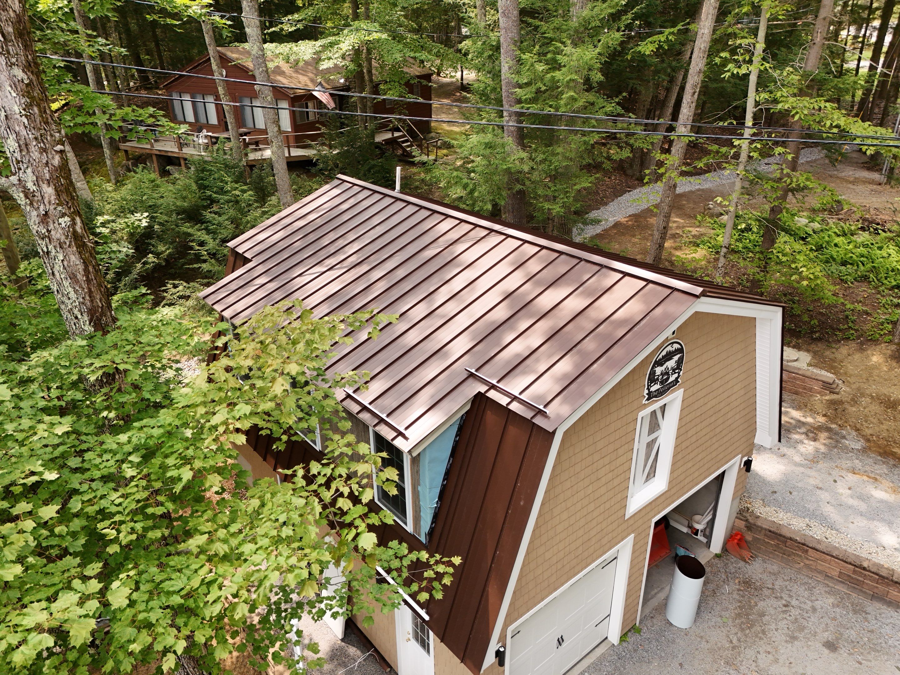 Standing Seam Metal Roof Replacement in Weare, NH – Drexel Roofing System  by Compass exteriors