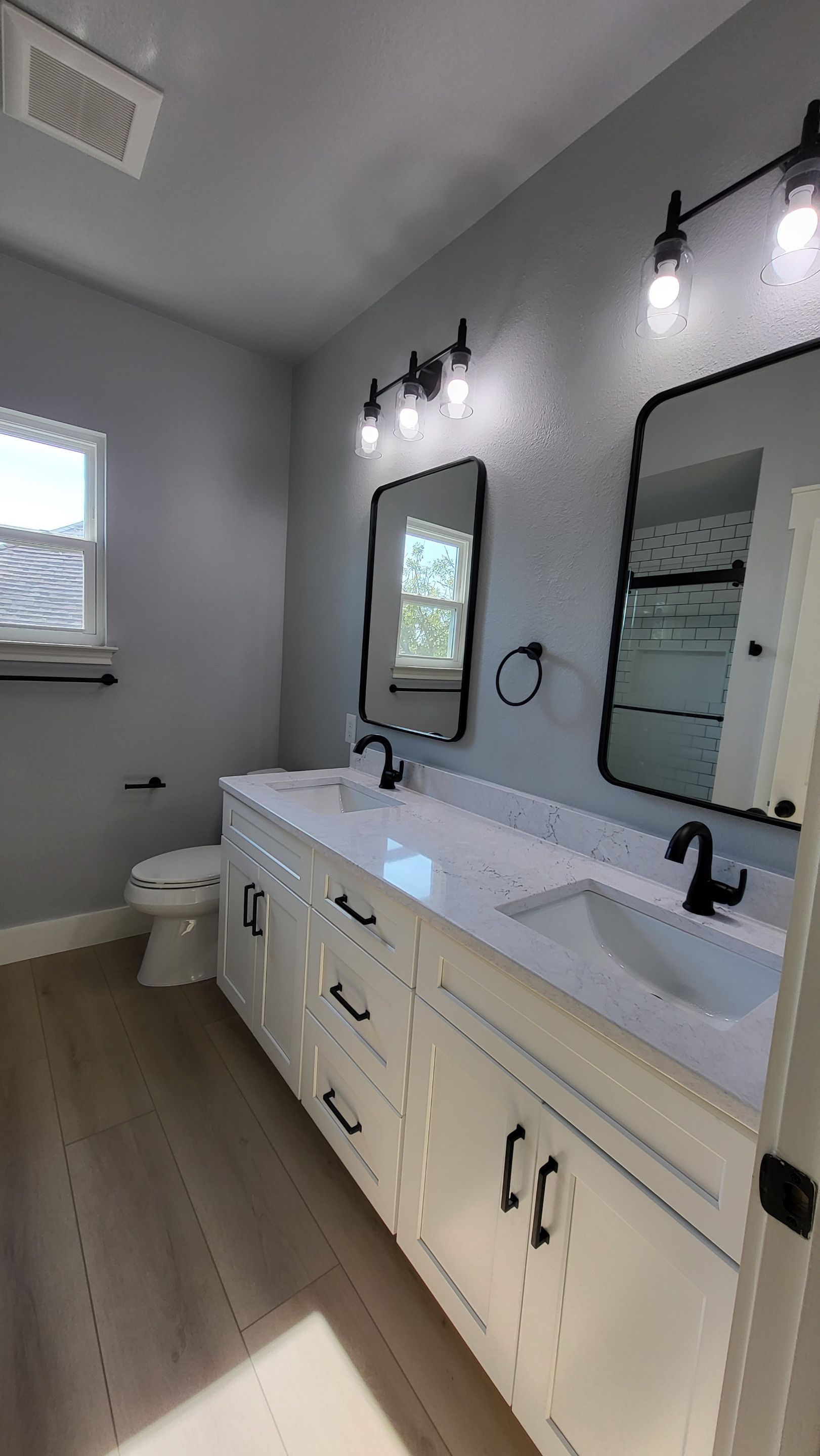 Stone Oak Bathroom Refresh with Modern Subway Tile Before and After by Legacy Bath and Kitchen