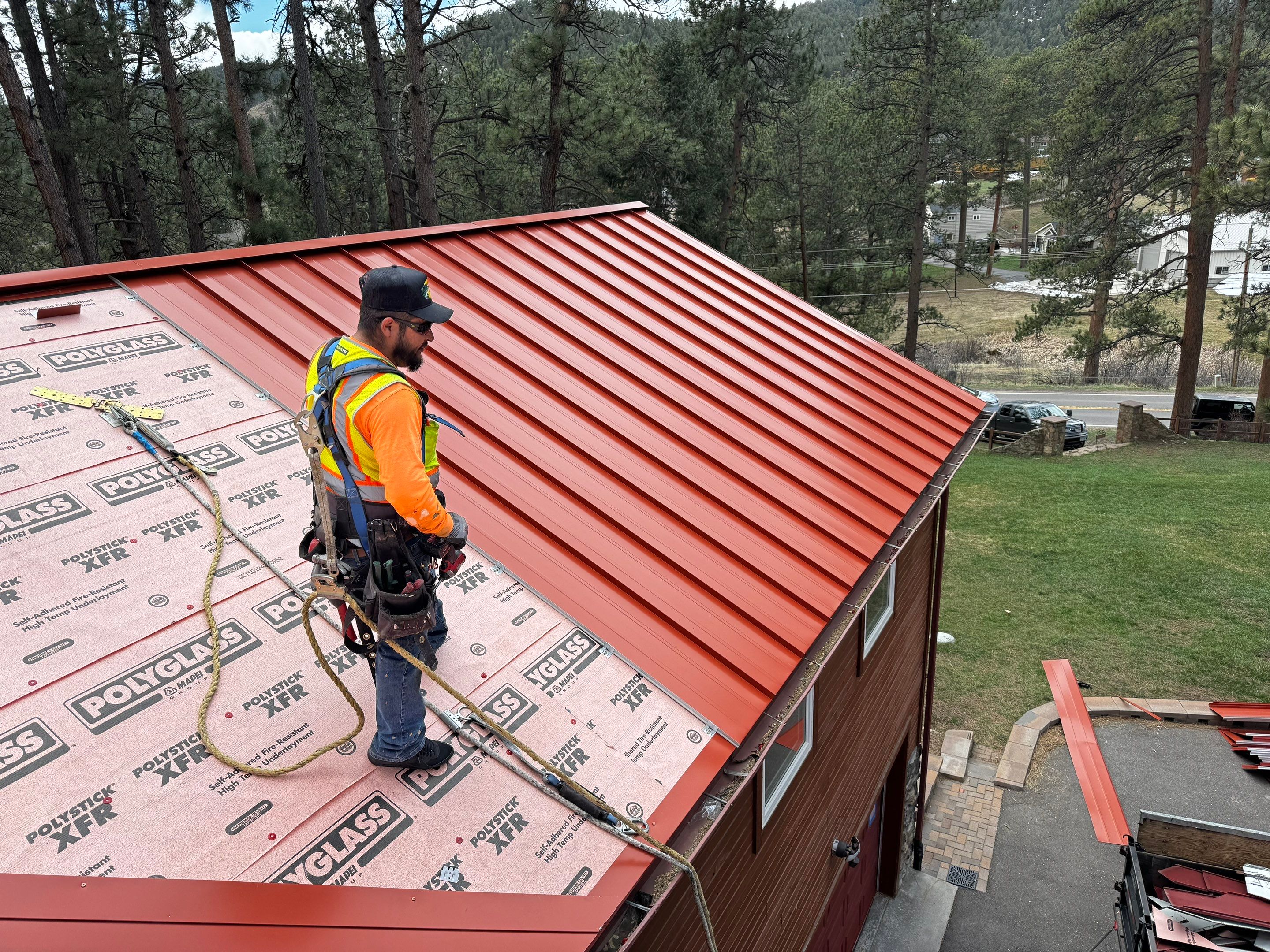 Residential Roofing Installation using Standing Seam Metal by Blue Peaks Roofing LLC 