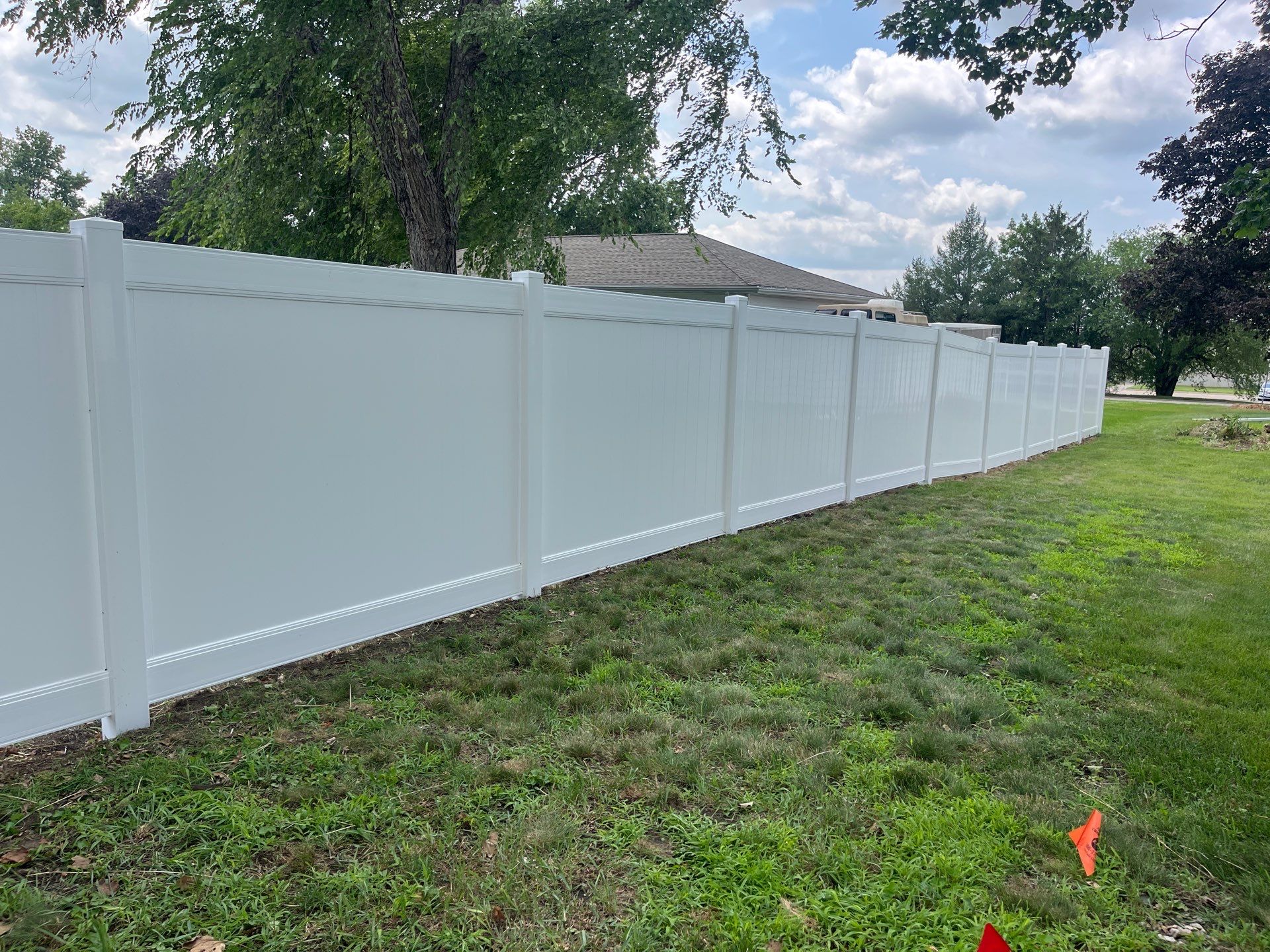 White Vinyl Privacy Fence Installation in Cedar Falls by Perfect Picket Fence and Stain