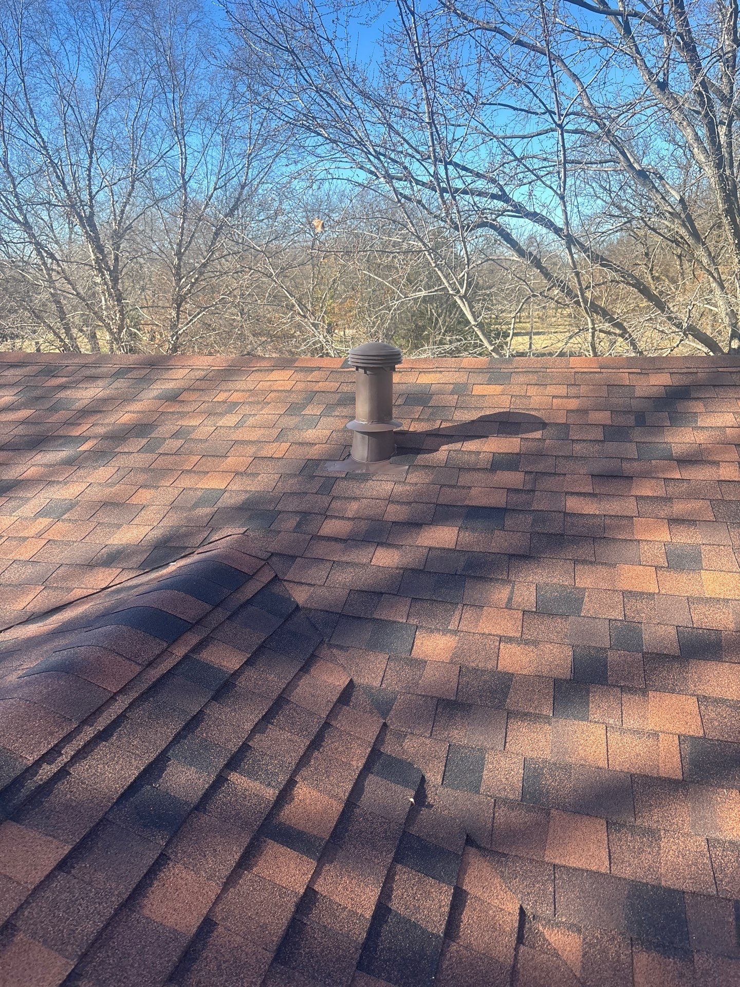 Storm Damaged Roof & Gutter Replacement by Eaton Roofing 