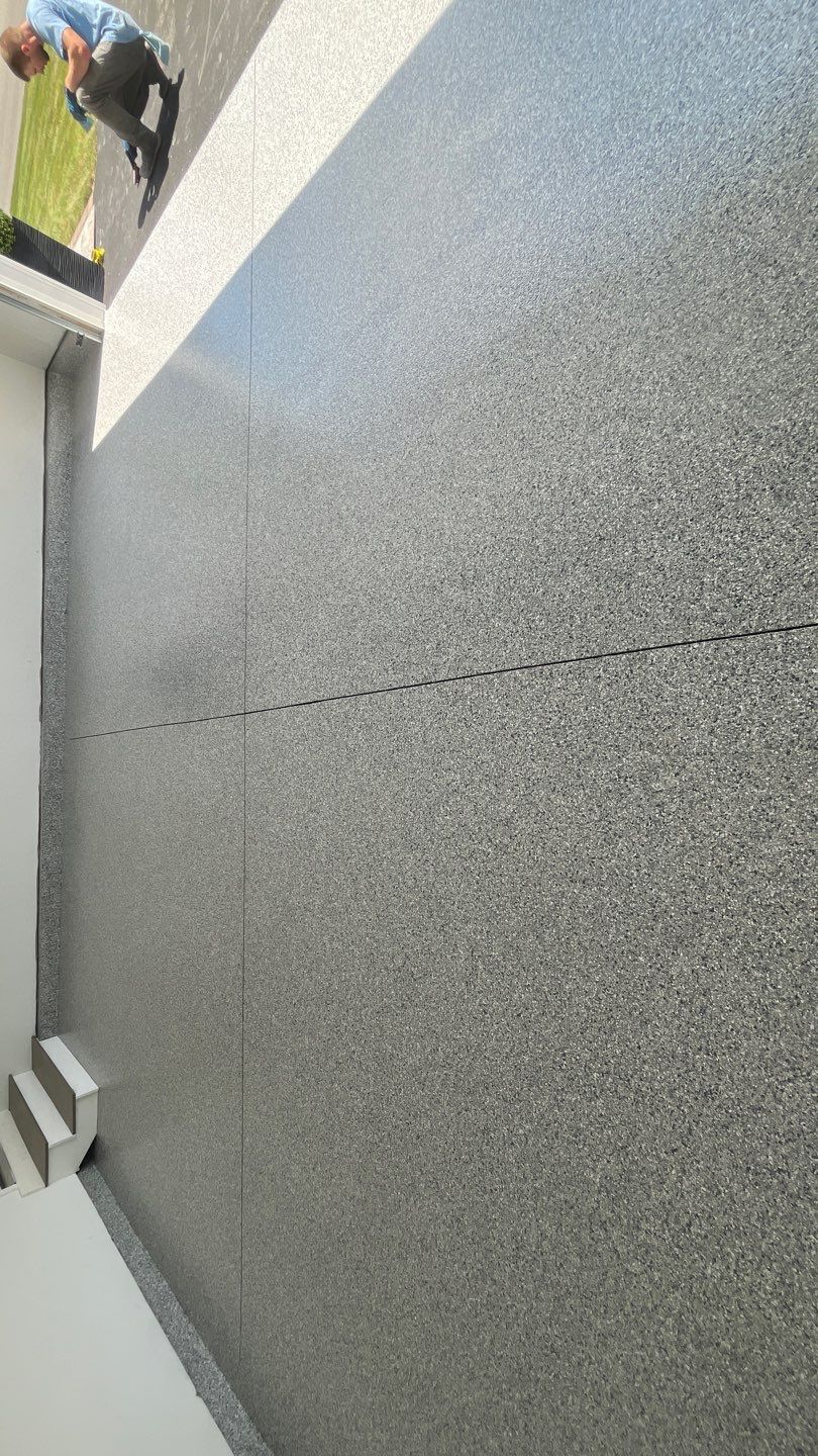 Garage in Londonderry, NH 03053 by Symphony Concrete Coatings
