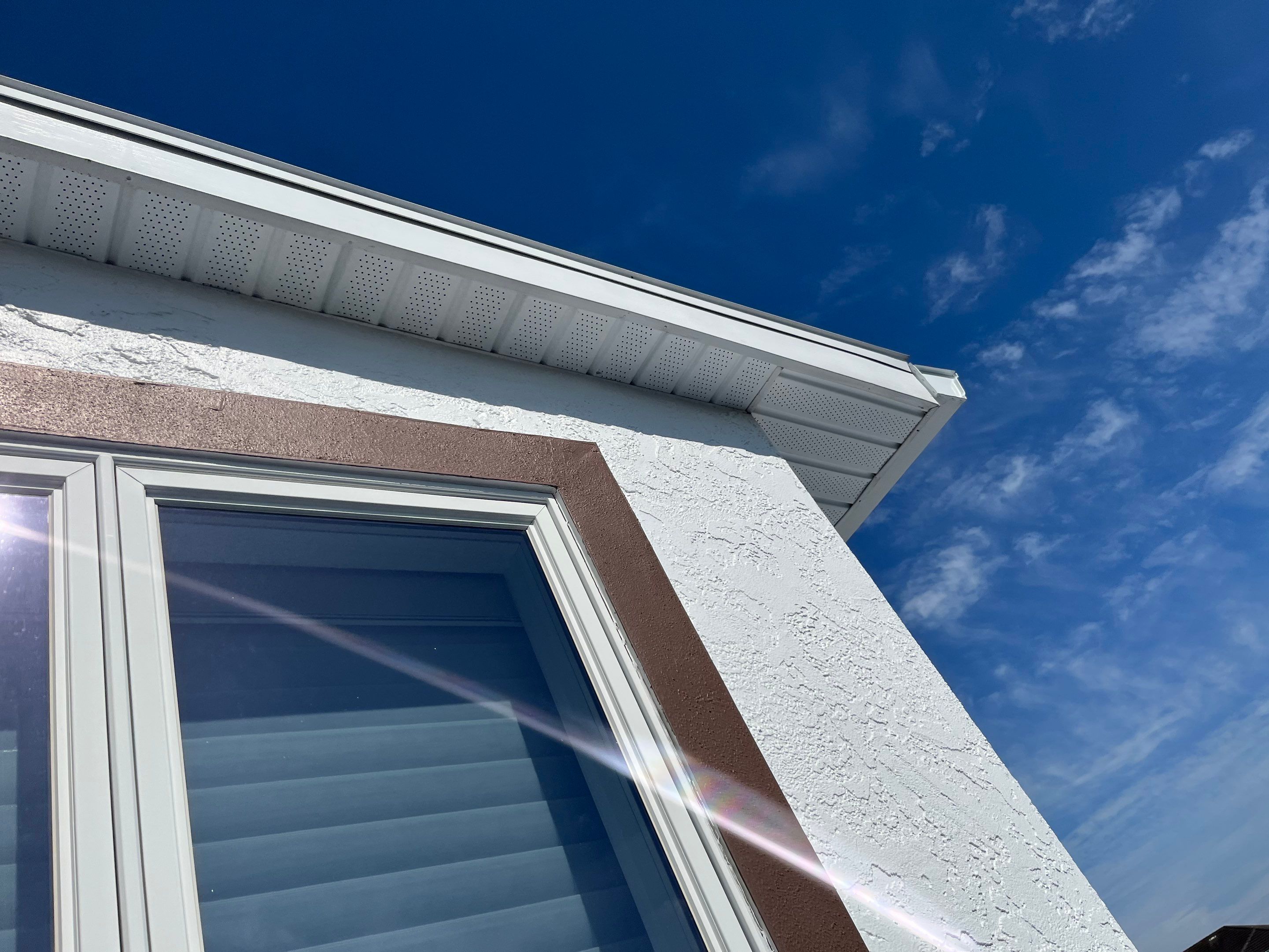 Repainting and Upgrading Gutters in Sarasota FL by Gutter Professors