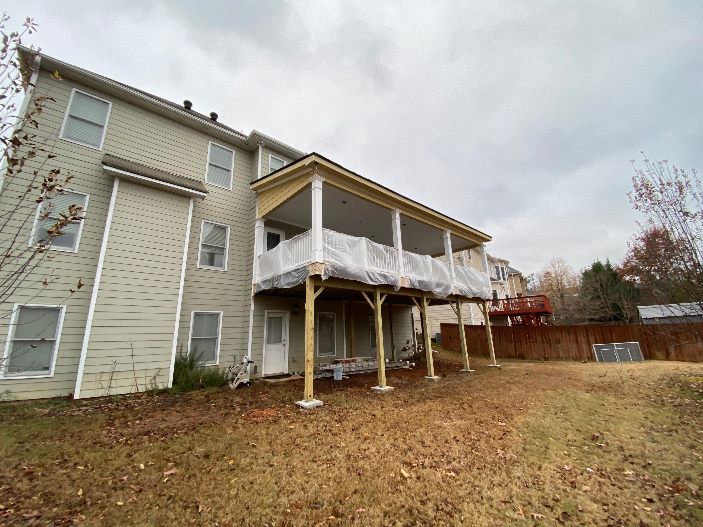 Custom Elevated Covered Porch Addition in Kennesaw by Swift Home Renovations 