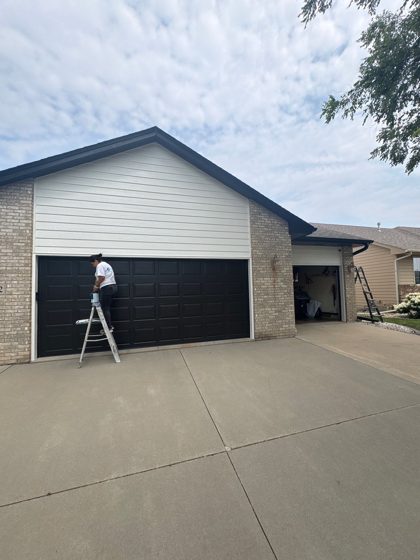 Residential Exterior Painting and Siding Refresh in Sioux Falls by Select Painting, Coatings & Garage Cabinets