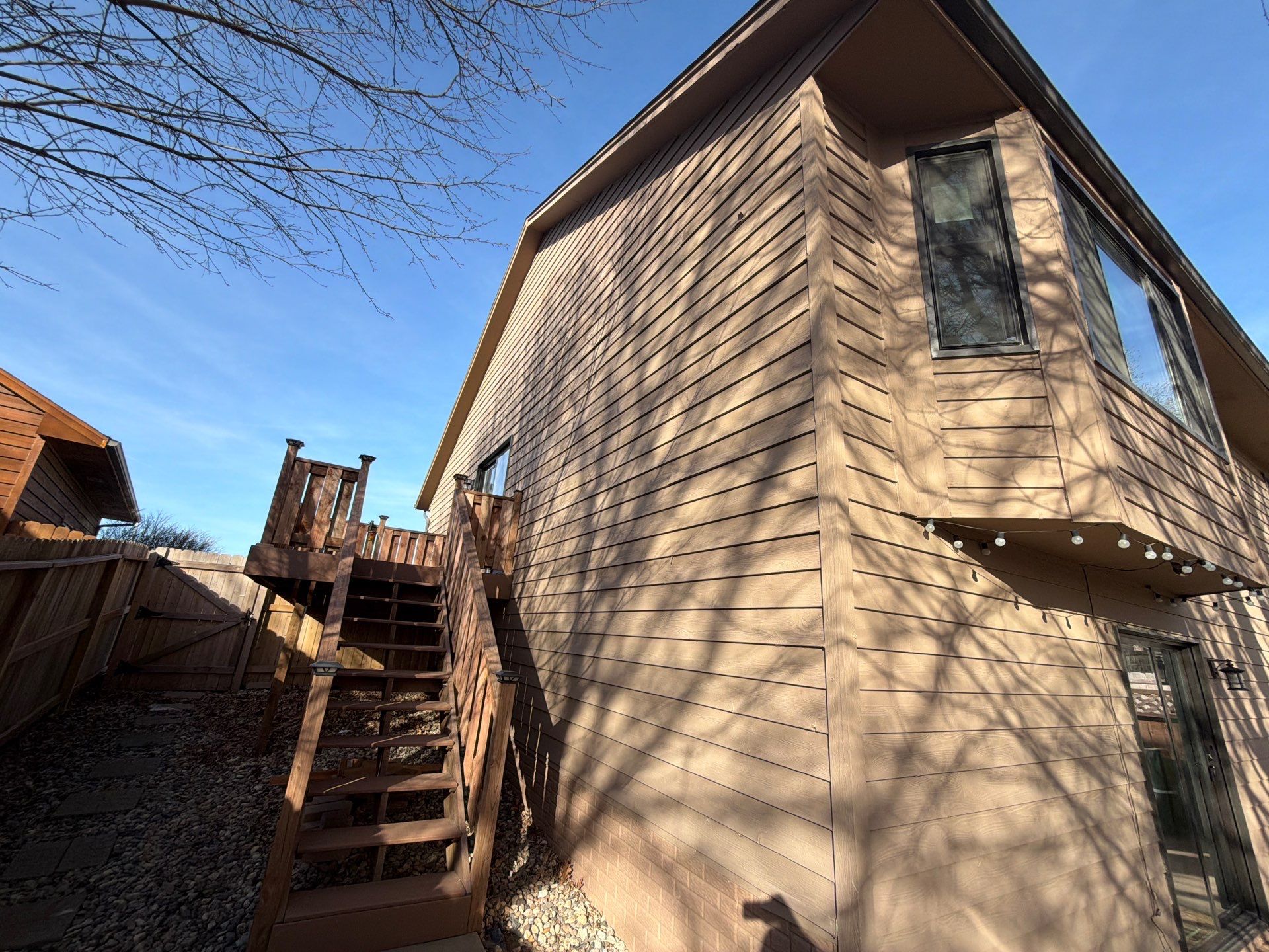 Wood Siding Restoration and Exterior Painting in Sioux Falls by Select Painting, Coatings & Garage Cabinets