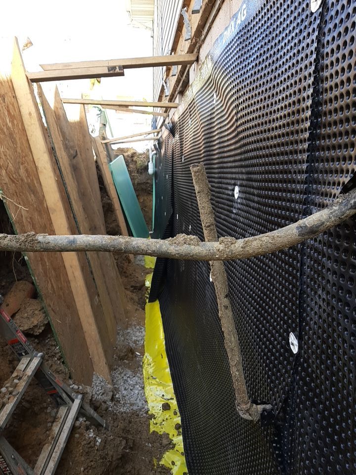 Wall Straightening and Reinforcement using Embedded Fiber Reinforcement by Toledo Basement Repair 
