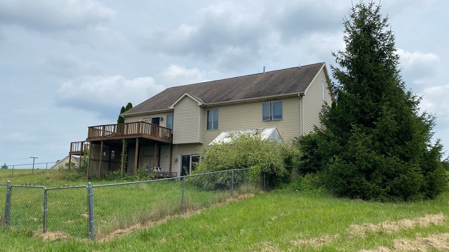 Slate Profile Metal Shingle Roof Replacement After Storm Damage in Columbia City, Indiana by 4Ever Metal Roofing