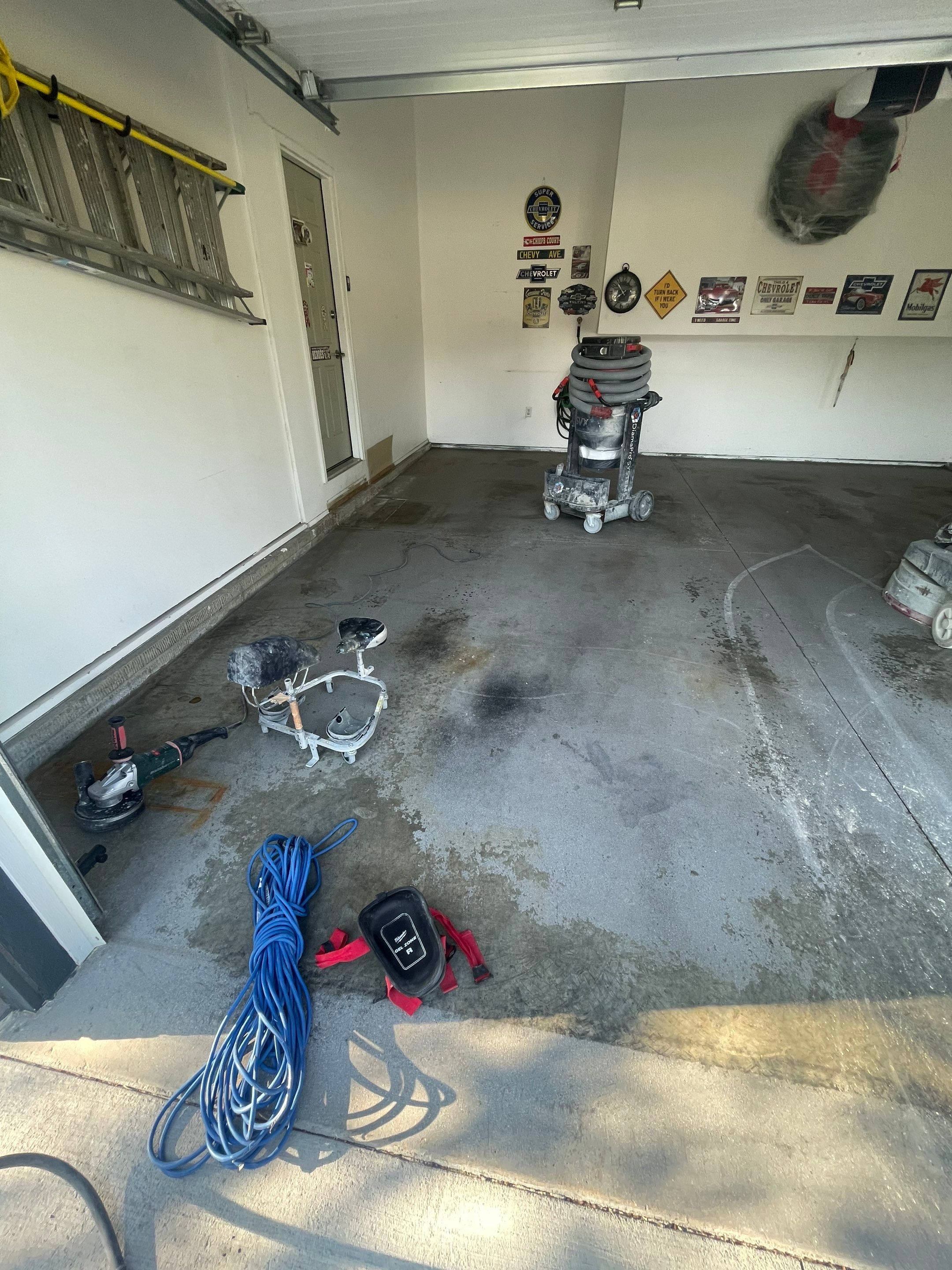 Sioux Falls Garage Floor Coating with Nightfall Decorative Chips by Select Painting, Coatings & Garage Cabinets