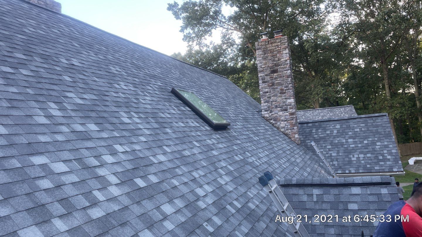 Roof Replacement using IKO Dynasty by American Home Contractors