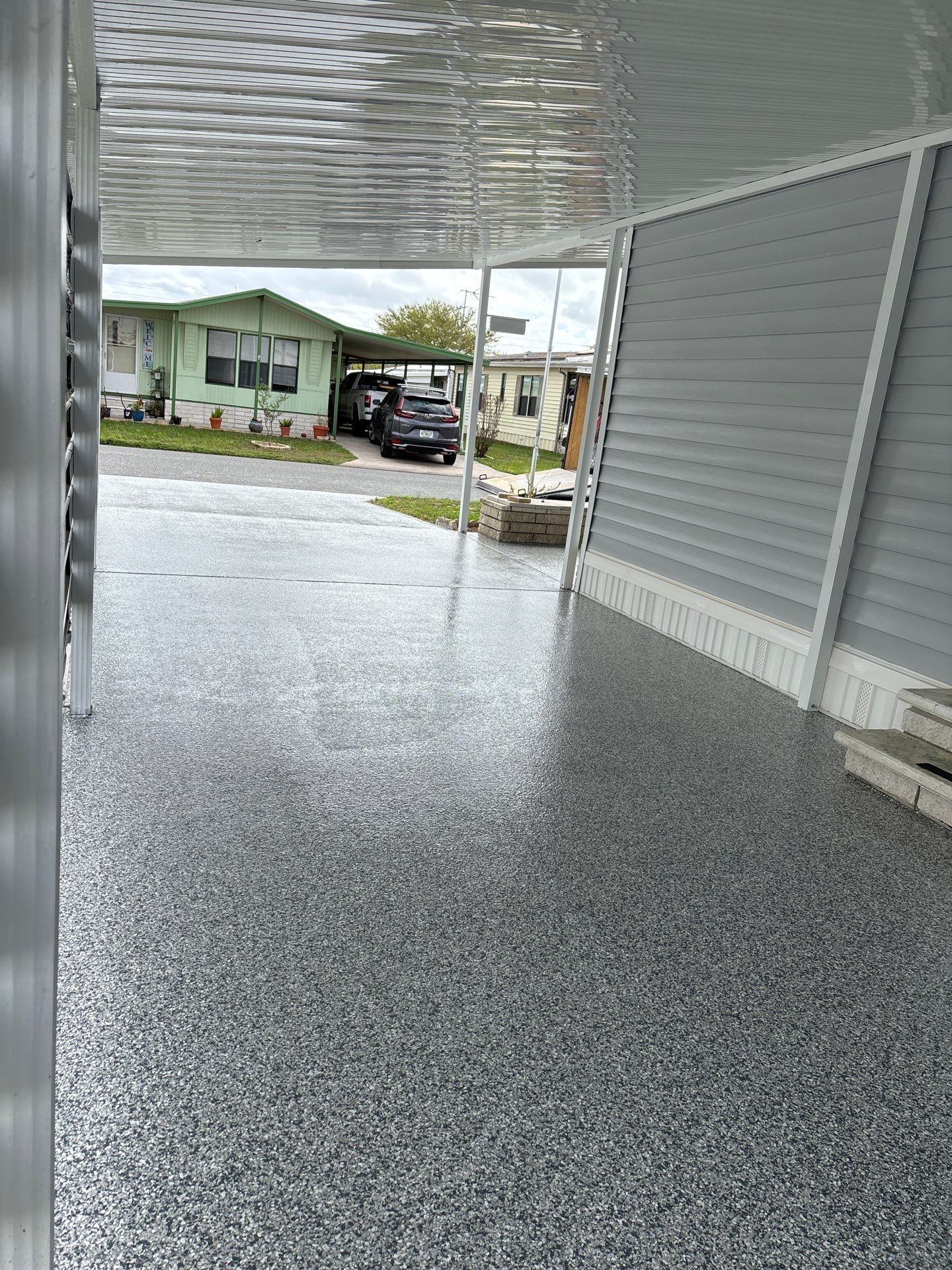 Driveway Floor Coating Using Gravel Flake by Performance Floors & Coating