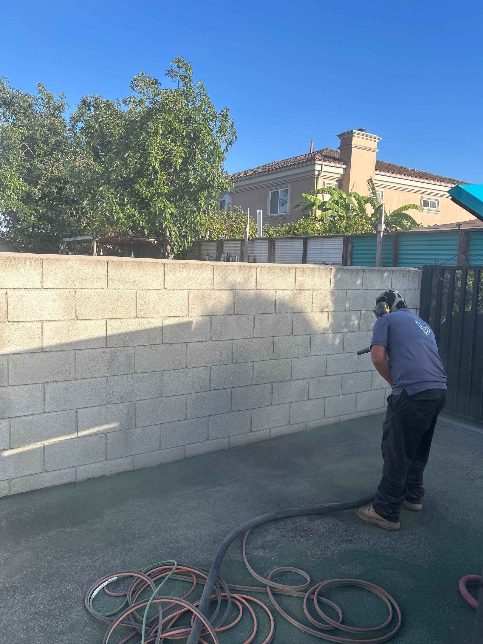 Sandblasting Graffiti Off Brick Wall In Downey, CA by La Power Washing Inc 