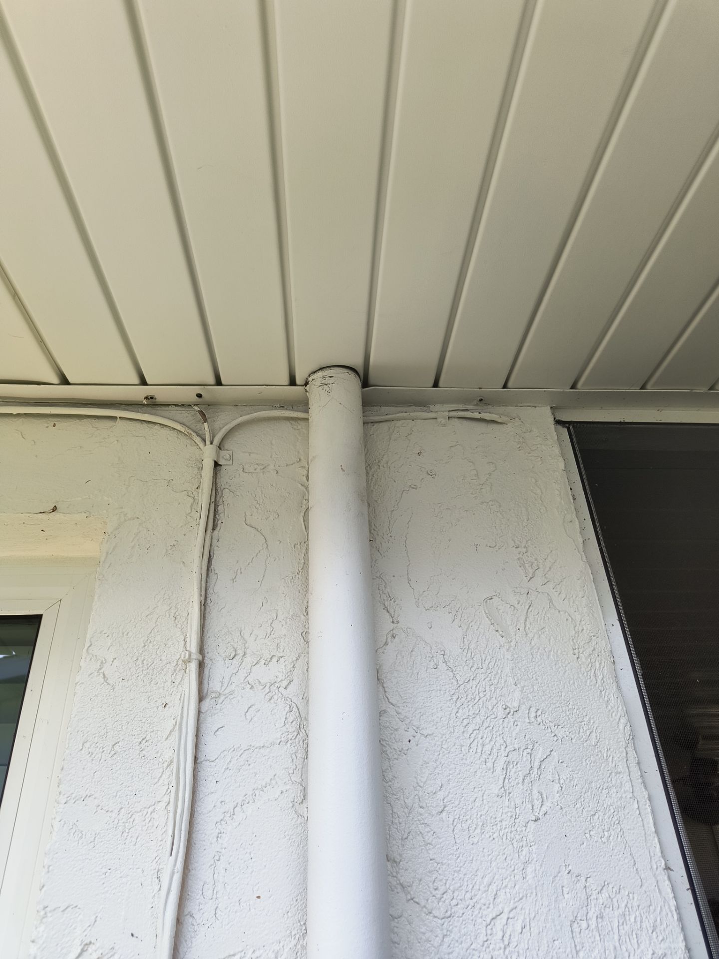 Aluminum White Soffit Installation in Sarasota FL by Gutter Professors