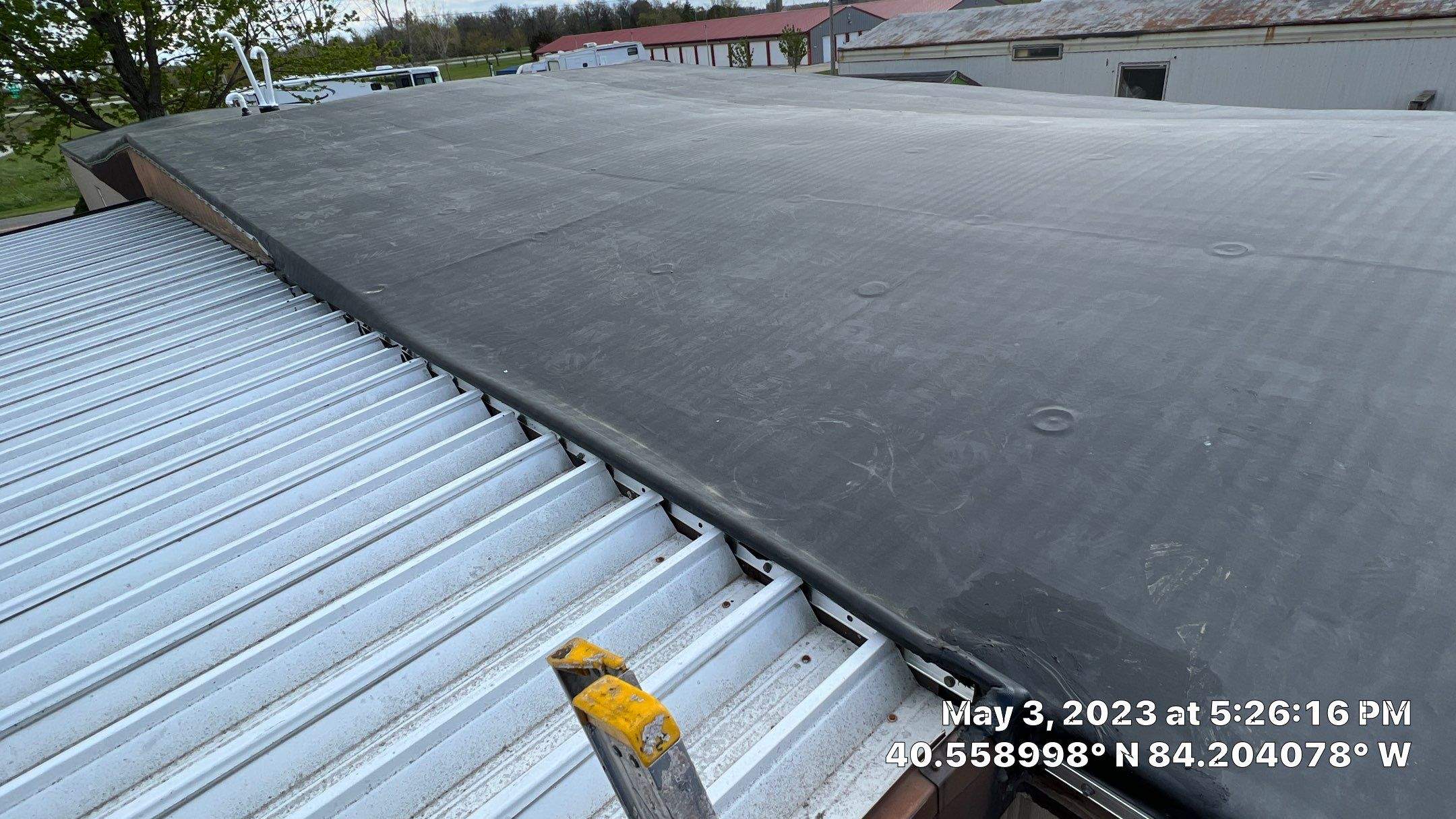 Residential Roofing Installation using 60 mil rubber roof  by Nitro Roofing and Construction