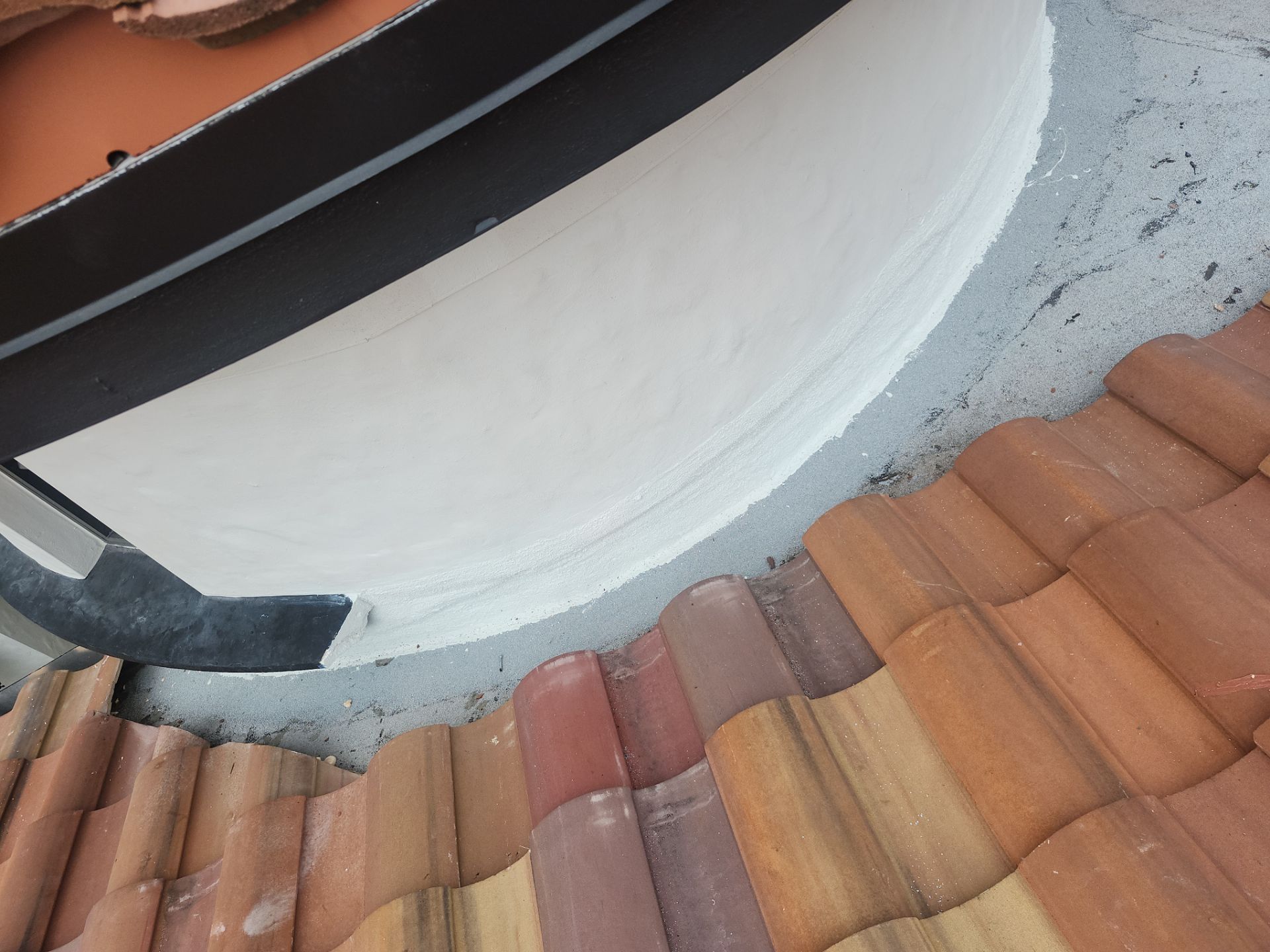 Tile Roof and Roof-to-Wall Repairs in Parkland by Aastro Roofing