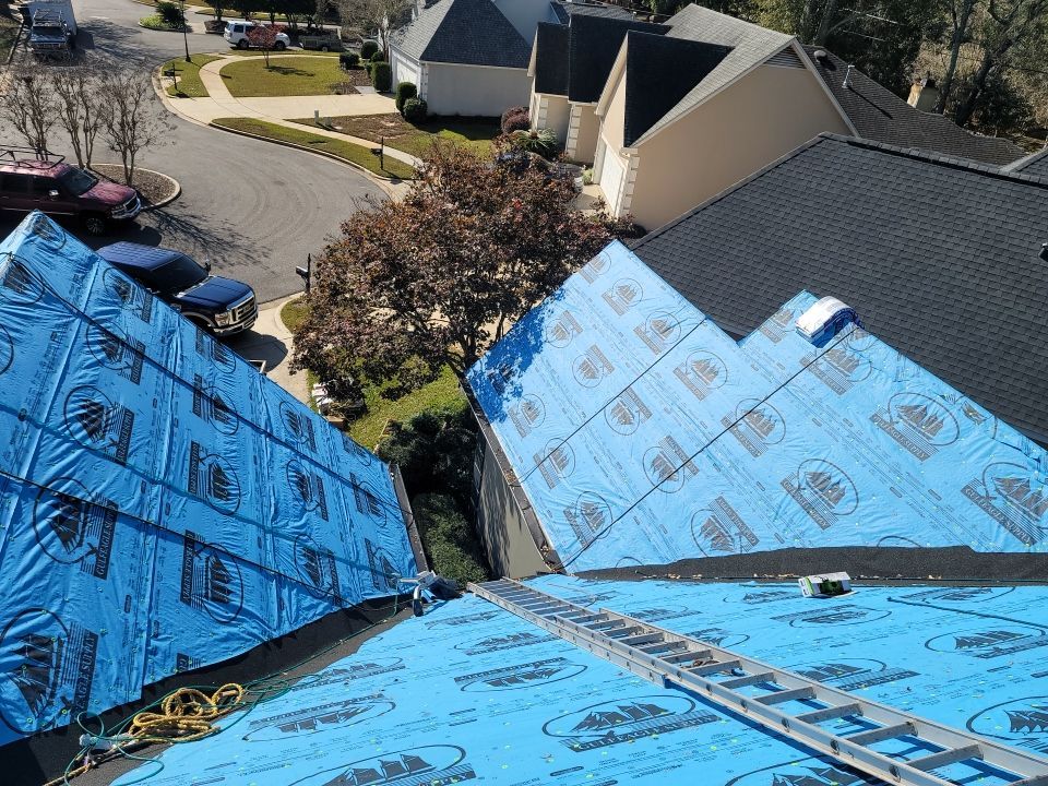 Residential Roofing Installation using Roof Replacement by American Roofing & Construction LLC