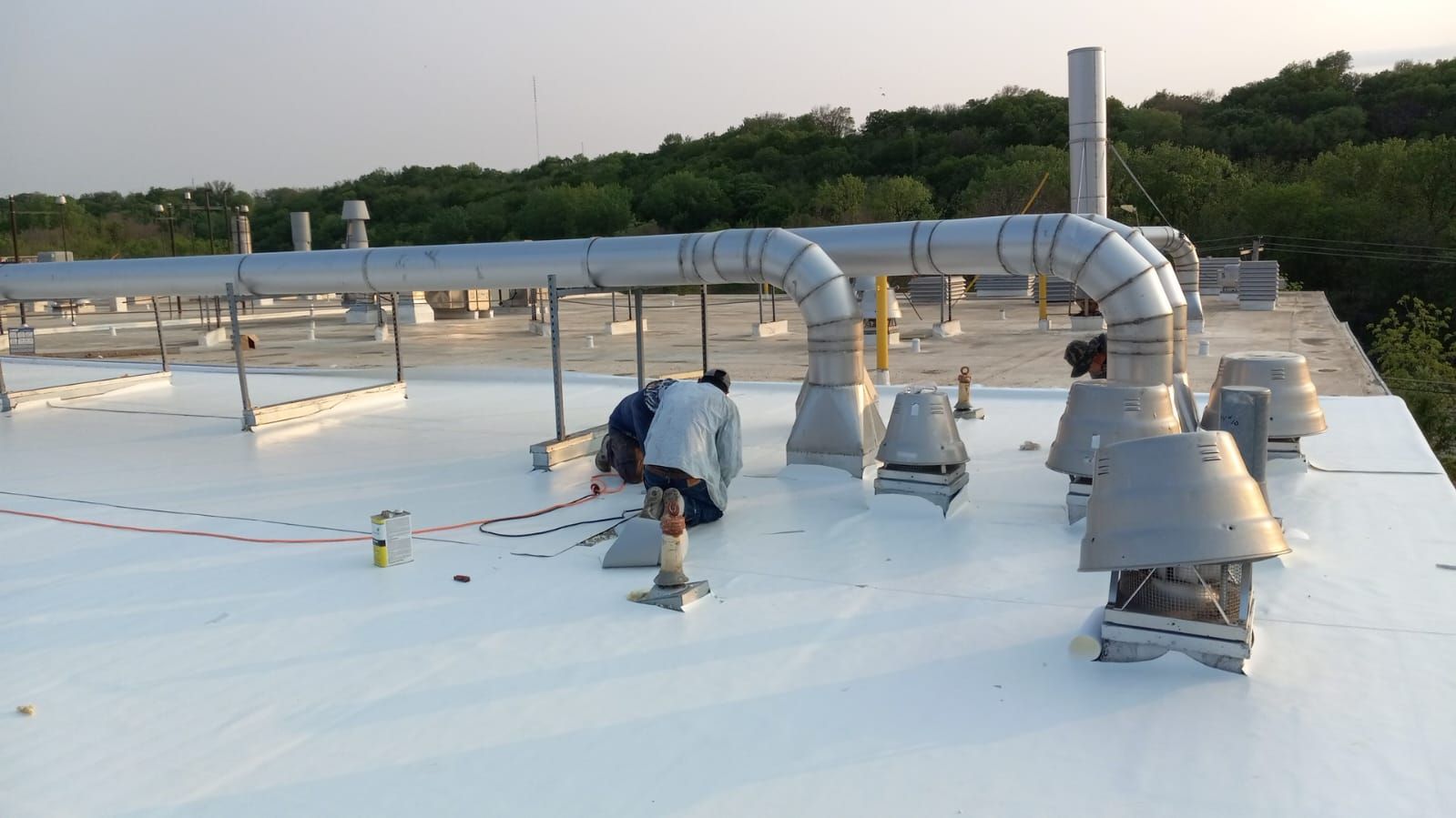 AML Riverside  by Grell Roofing, LLC