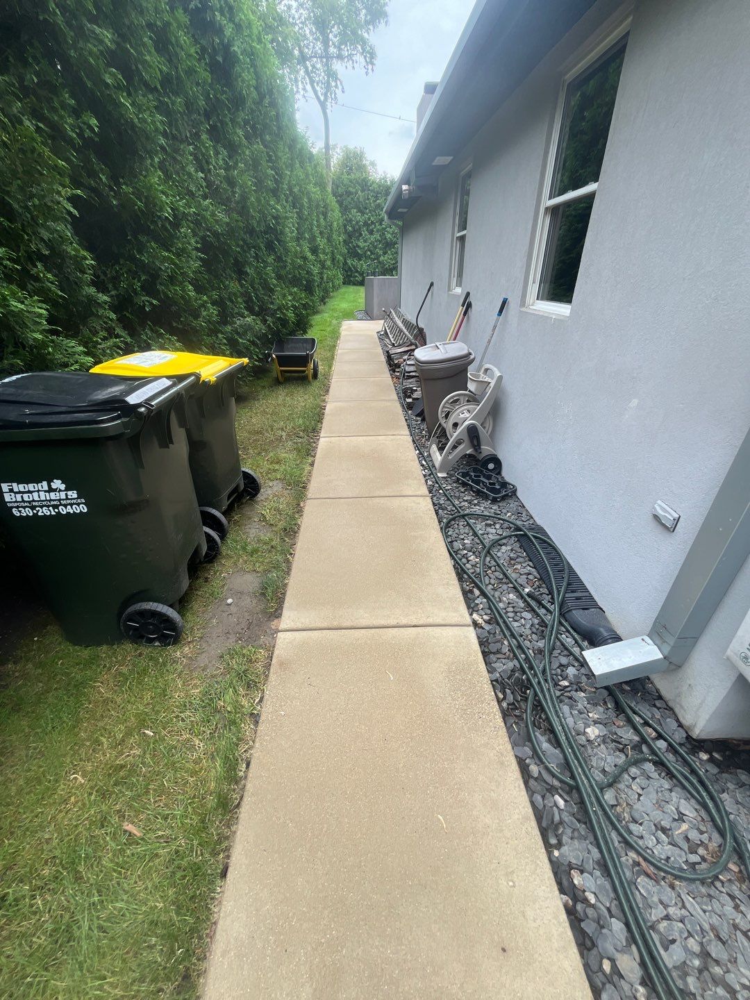 roof washing using Algaecide, soft wash soap by Northern Power Washing LLC.