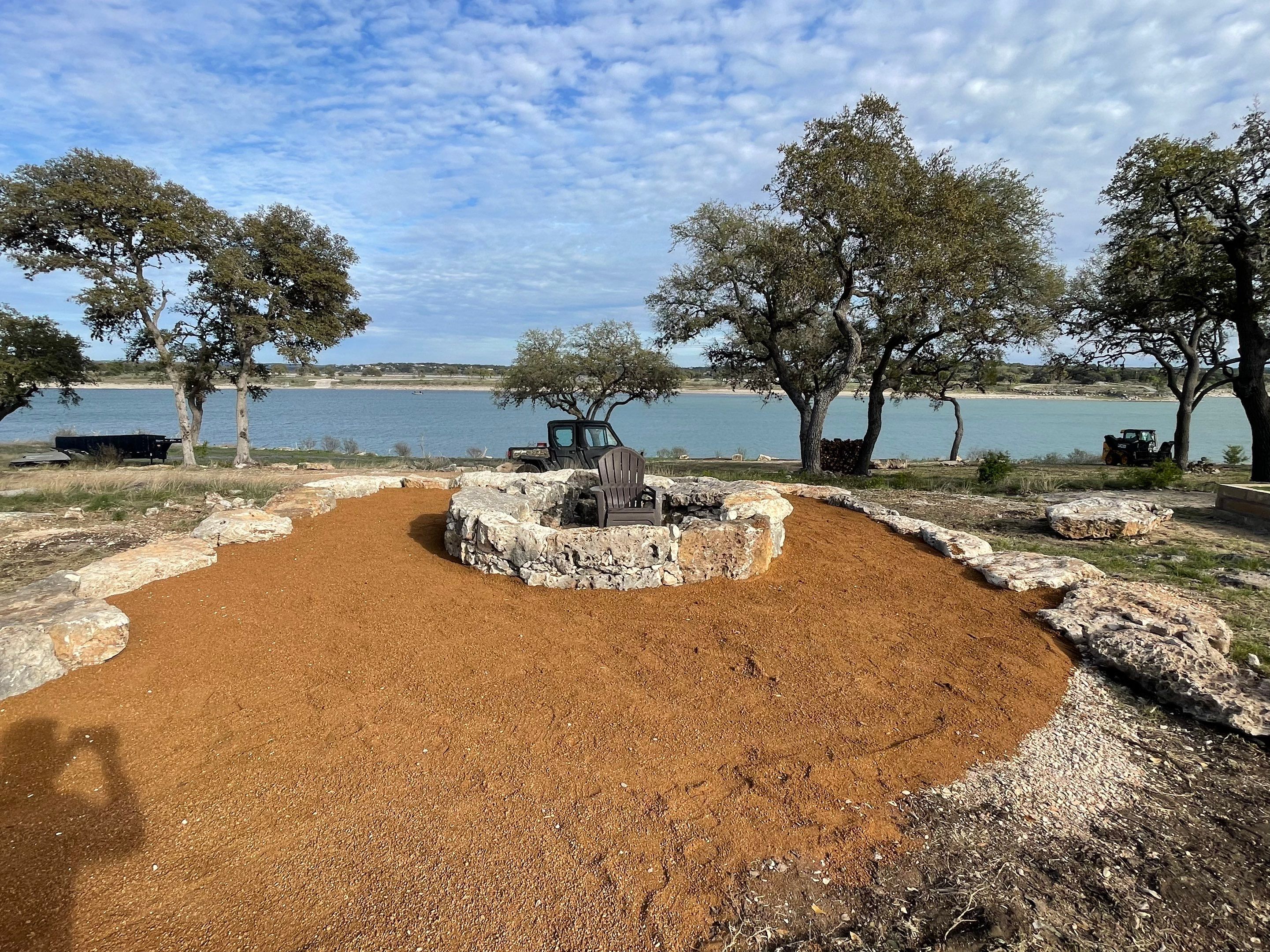 Lakeside Firepit and Turf Area by Singer Services