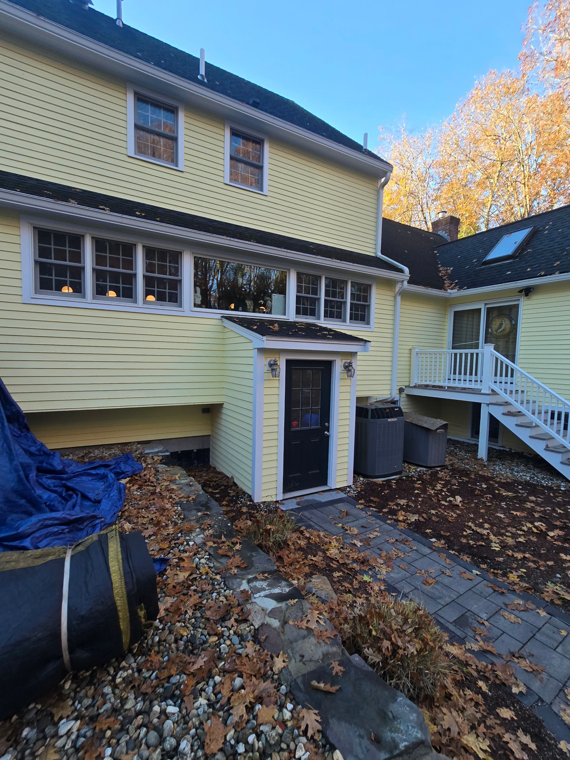 Chelmsford Premium Roof: Onyx Black Shingles with Standing Seam Metal Porch by Mighty Dog Roofing of Greater Middlesex County