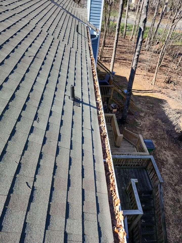 Gutter Cleaning using water by Power Wash Masters LLC