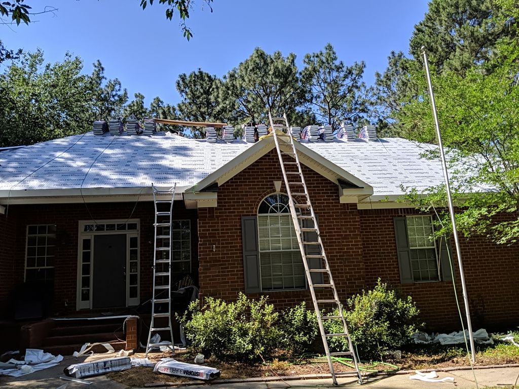 Residential Roofing Installation using Roof Replacement by American Roofing & Construction LLC