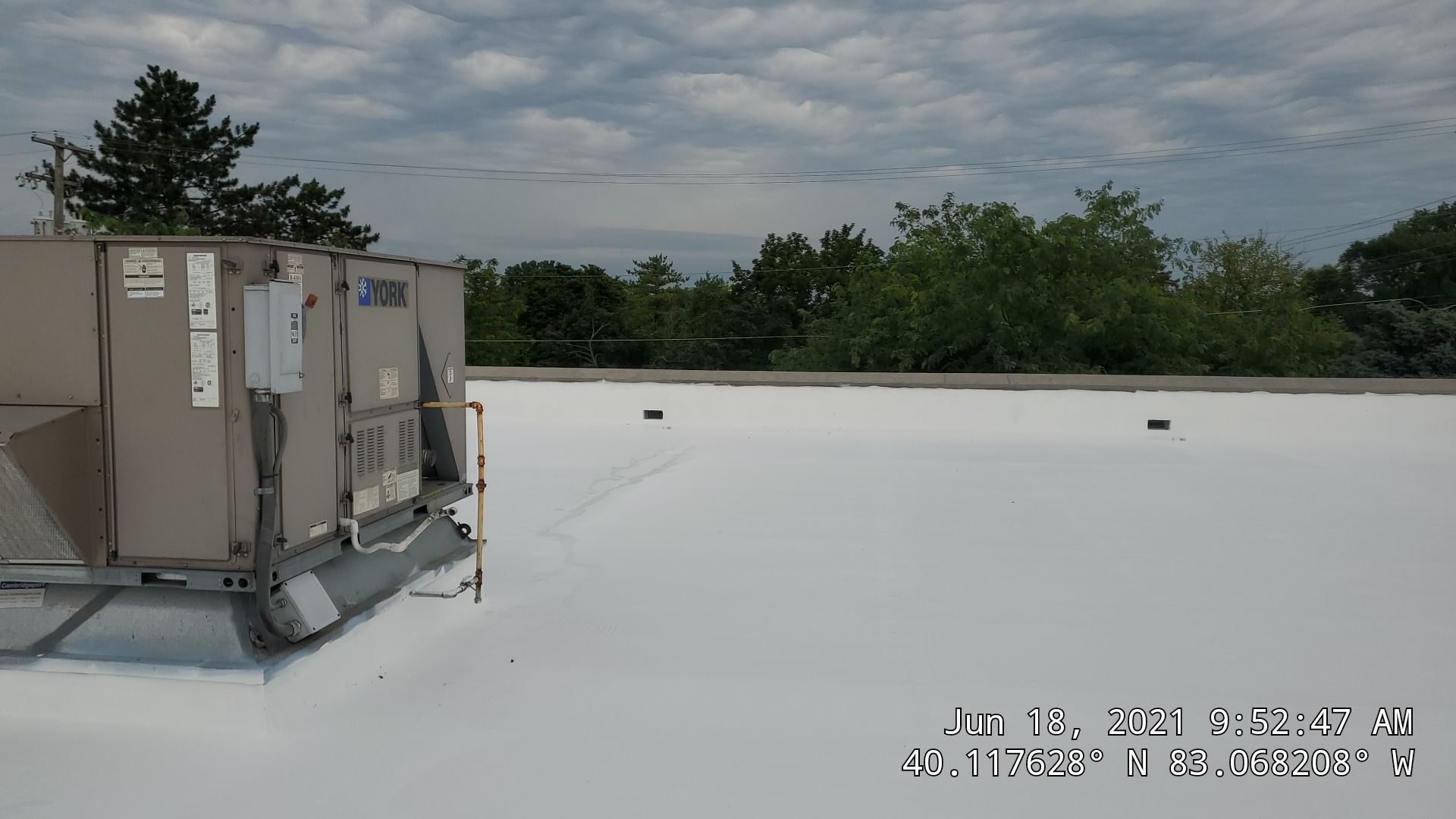 Fabric Reinforced Roof Coating by Gold Star Roofing LLC 