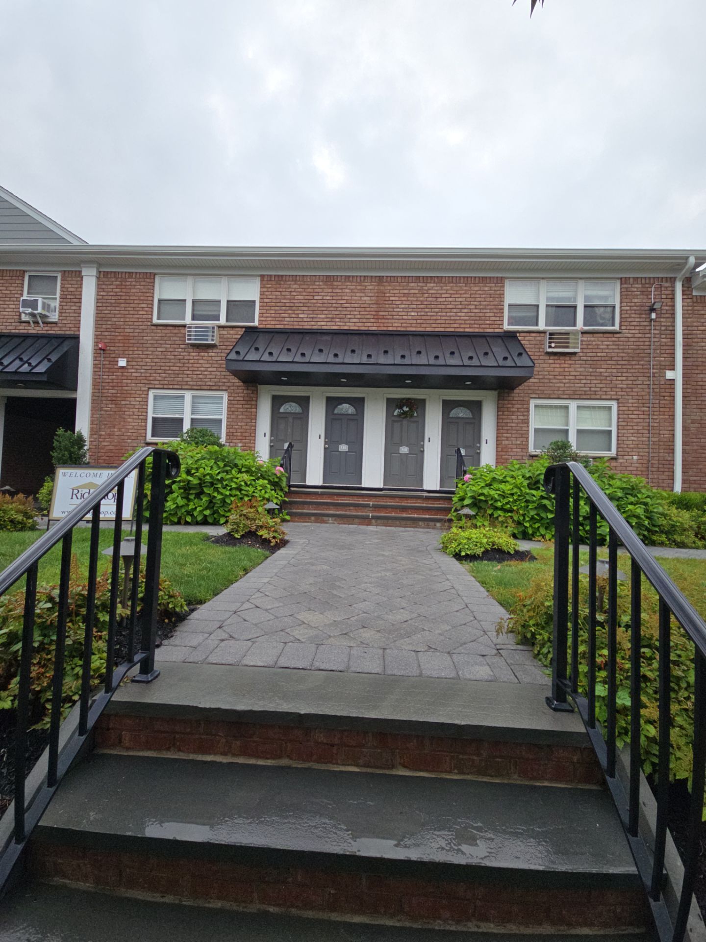 Multi-Unit Apartment Complex Exterior Brick Painting Project in Hackensack by Spectrum Painting, LLC