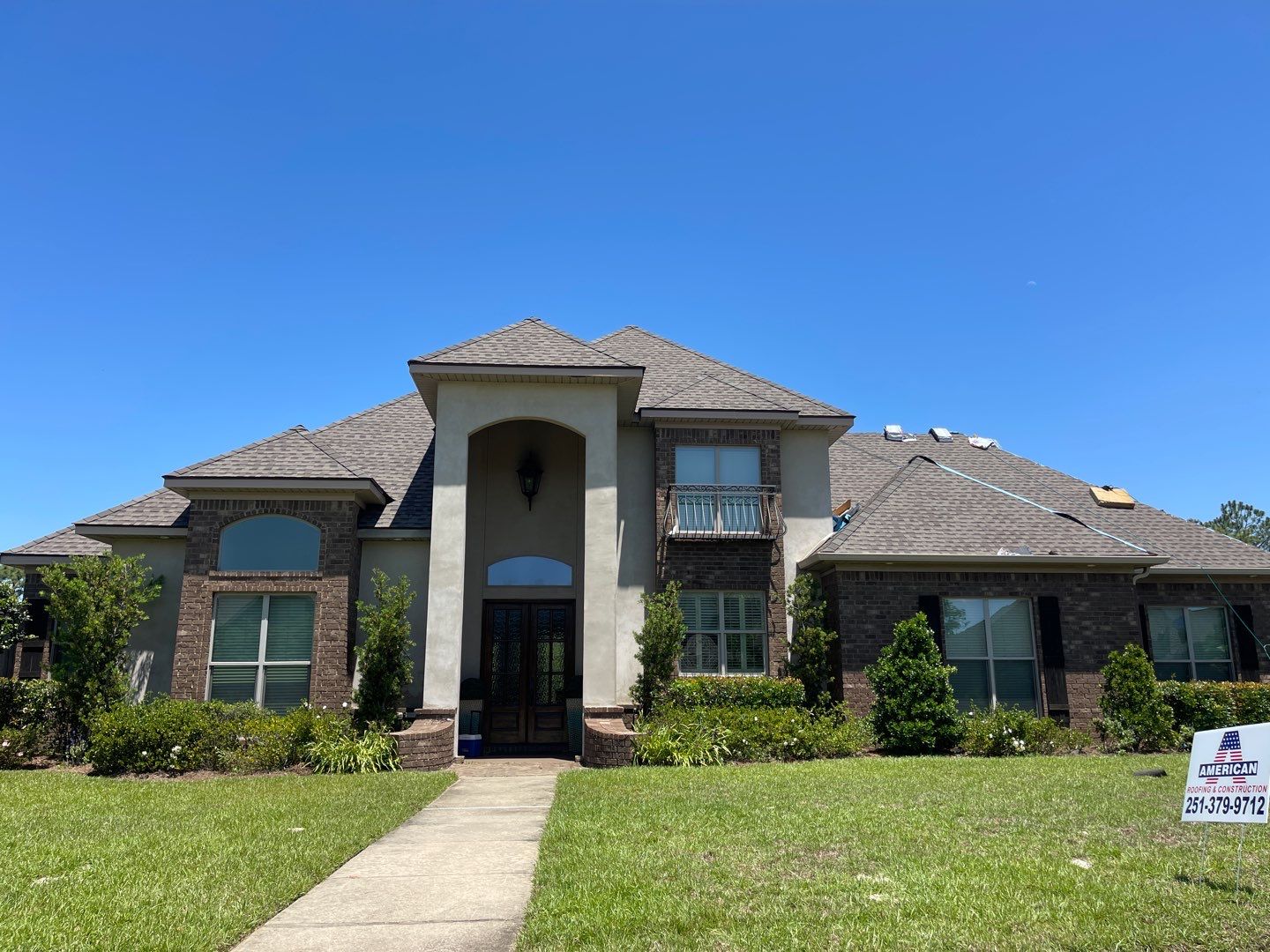 Residential Roofing Installation using Roof Replacement by American Roofing & Construction LLC
