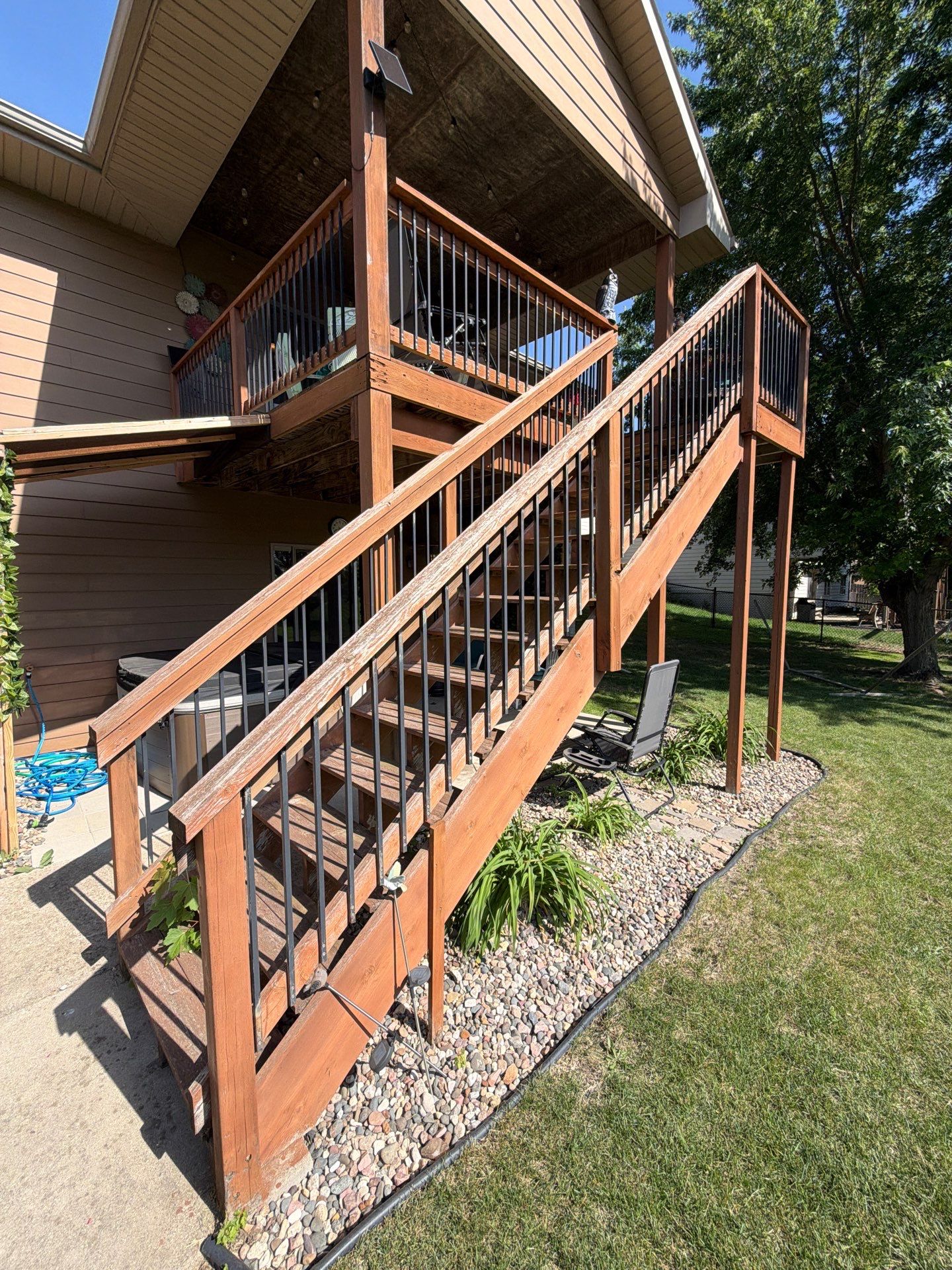 Full Exterior Residential Painting and Siding Refresh in Tea by Select Painting, Coatings & Garage Cabinets