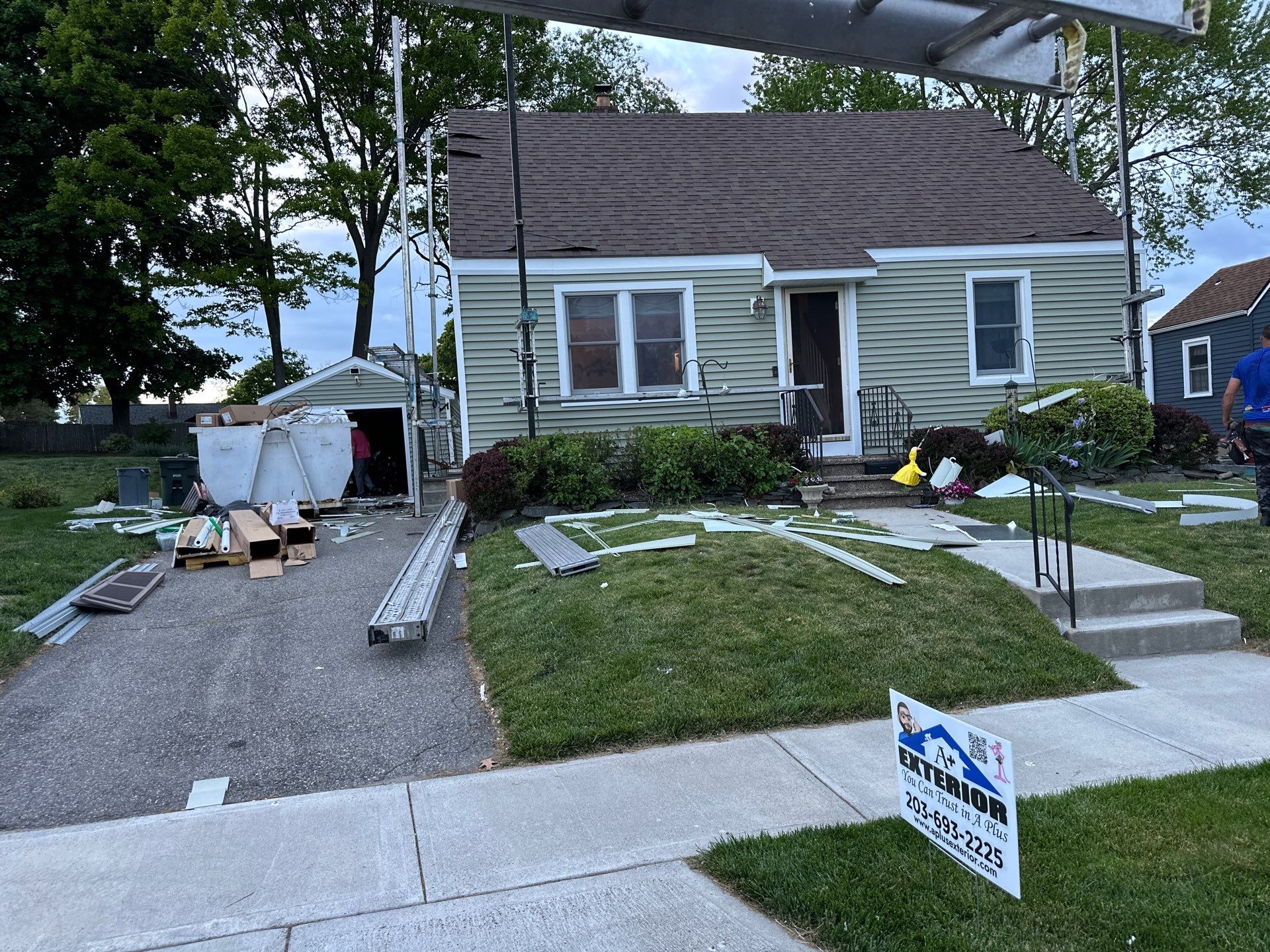 New Vinyl Siding Installation for Milford Home and Detached Garage by A Plus Exterior