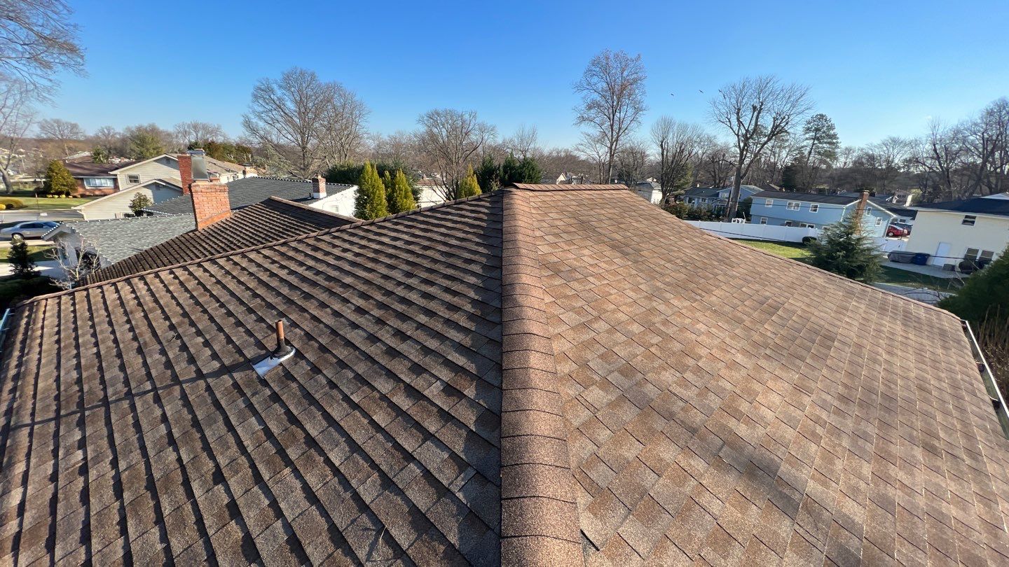 Onyx Black Shingles by Reimagine Roofing