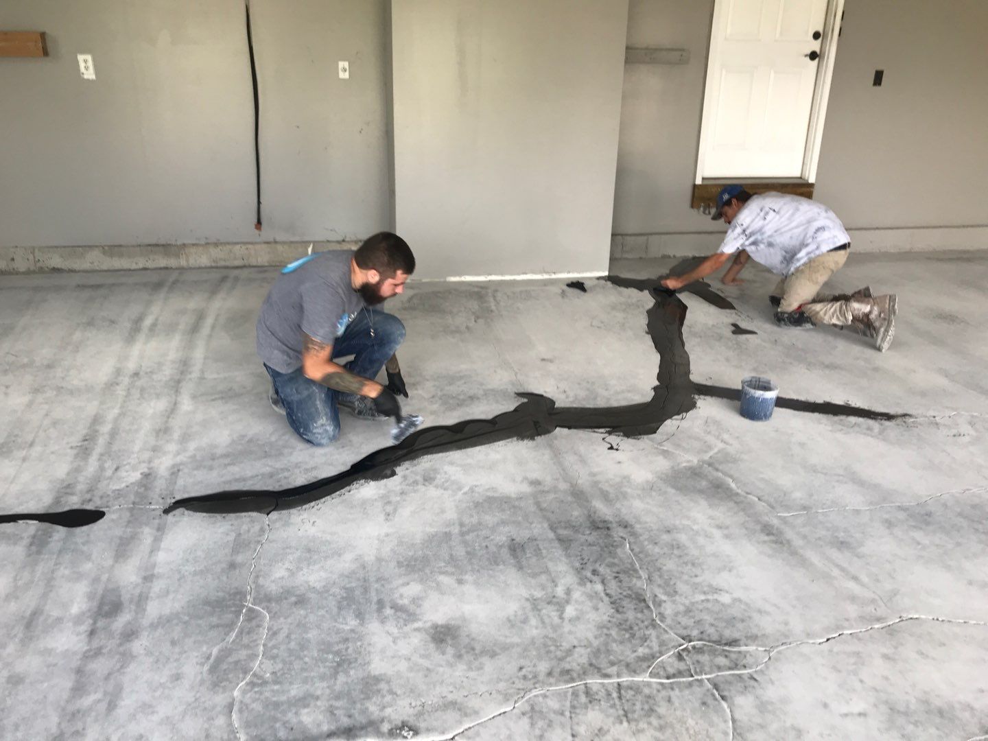 Garage using Domino  by Select Painting, Coatings & Garage Cabinets