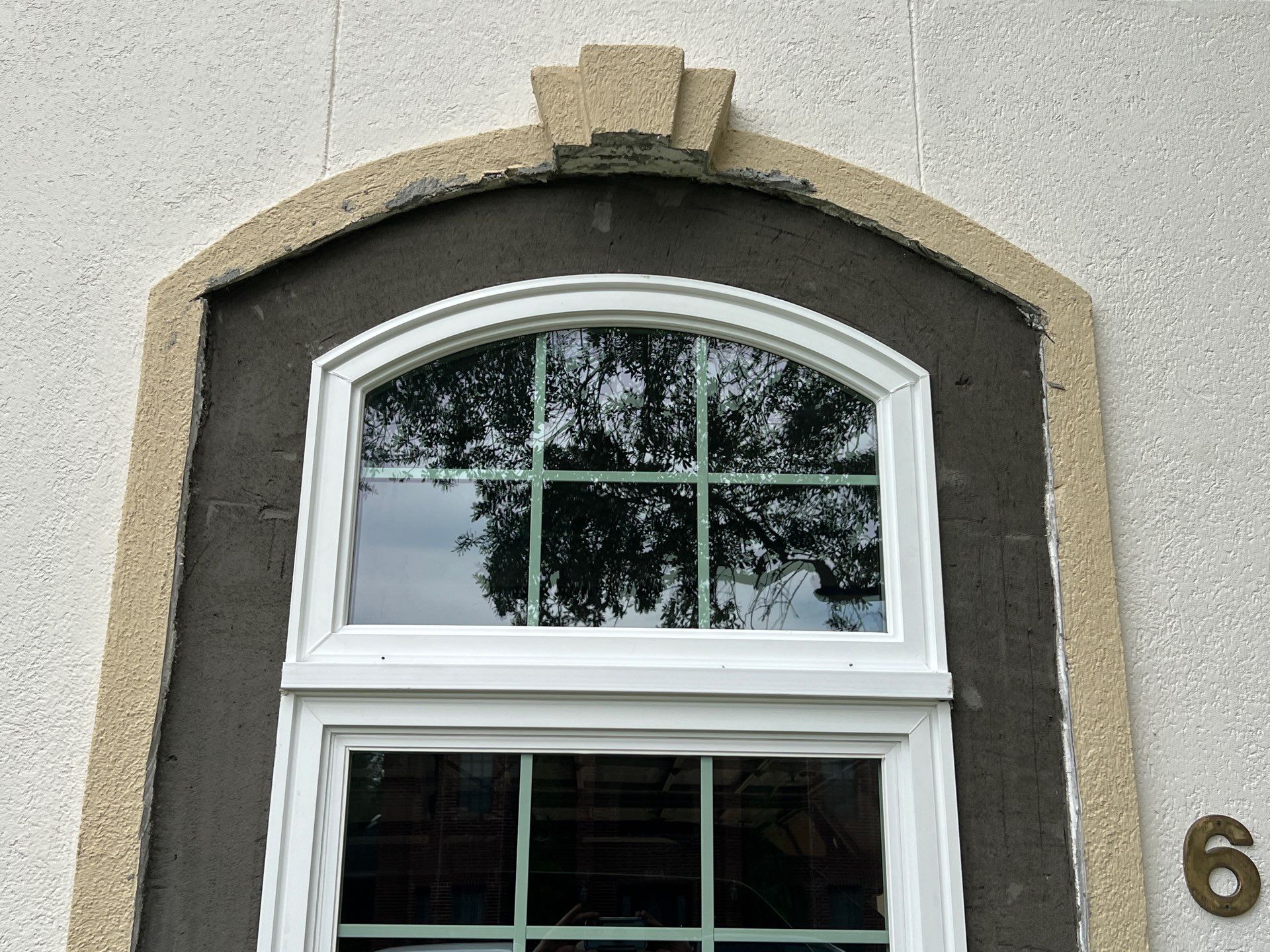 Installing Windows on a Submarine  by Bayfront Roofing and Construction