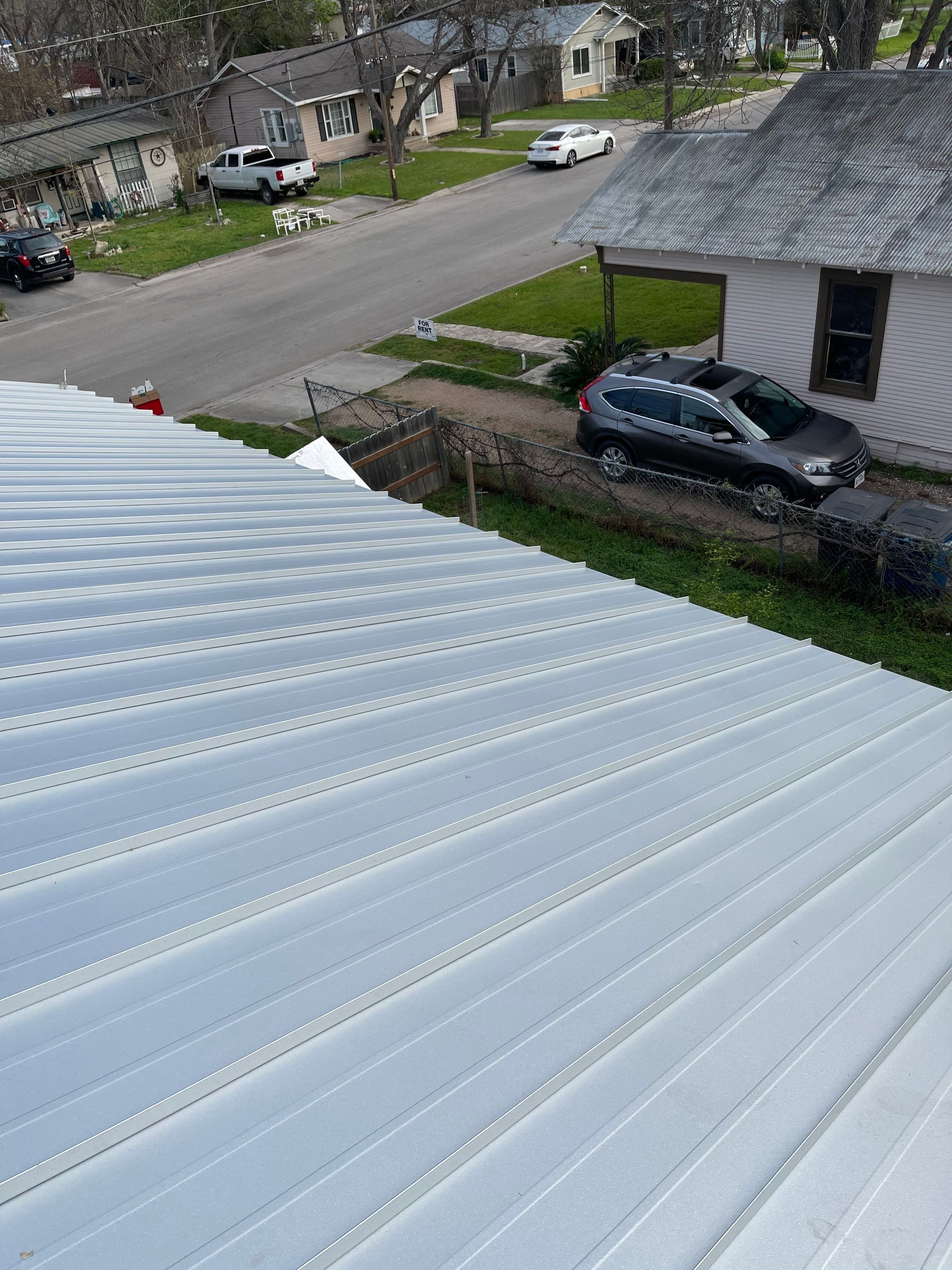 Residential Metal Roof Installation using McElroy Metal by Premier Roofing and Contracting