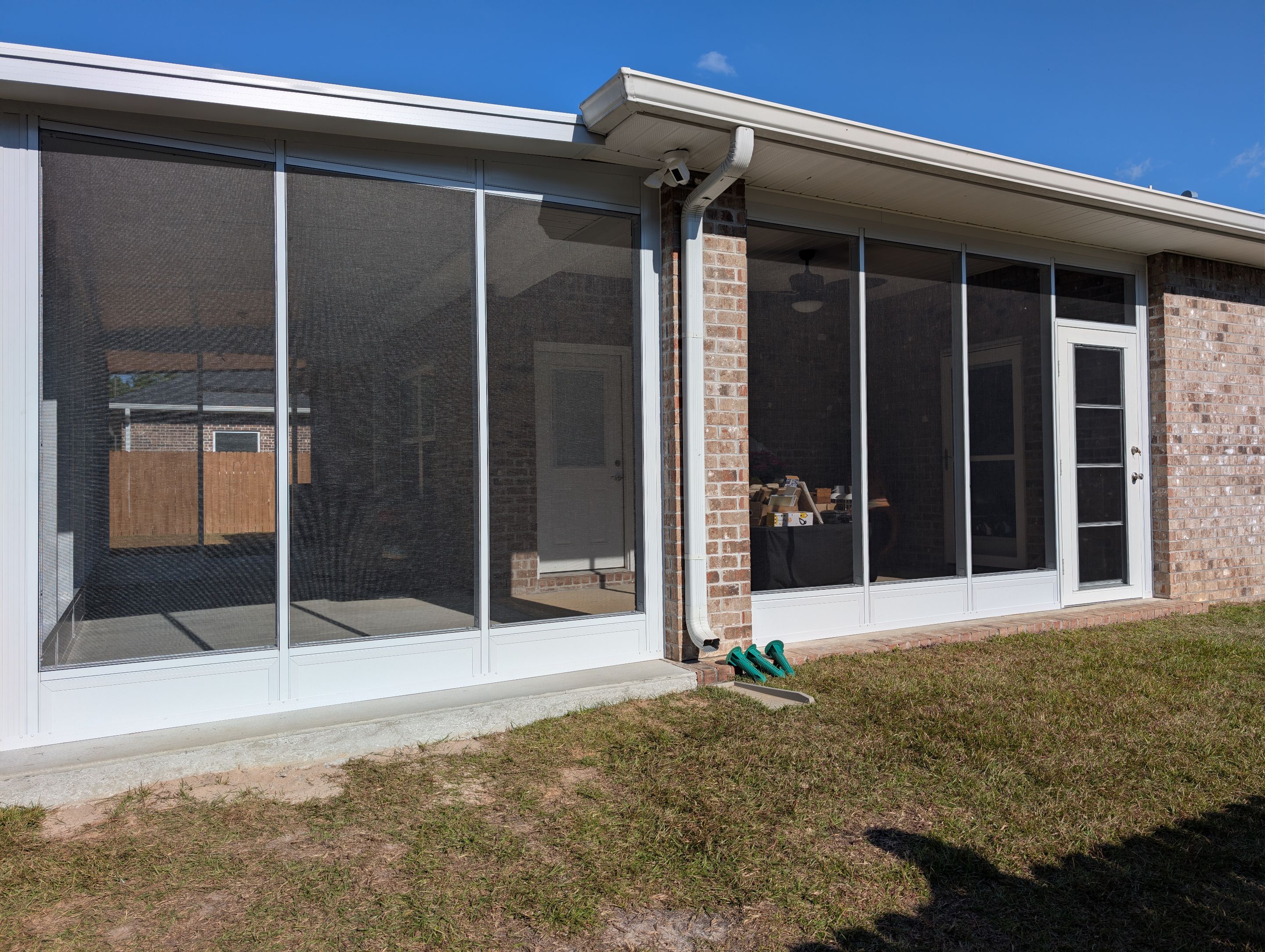 Home addition w/Vinyl 4-Track Windows by Titan Sunrooms
