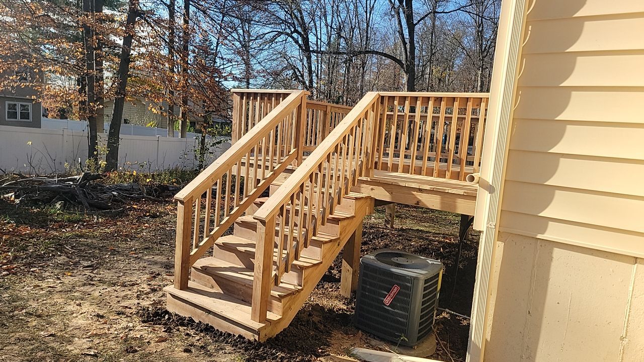 Deck Installation using Treated Lumber by Avalon Roofing and Exteriors